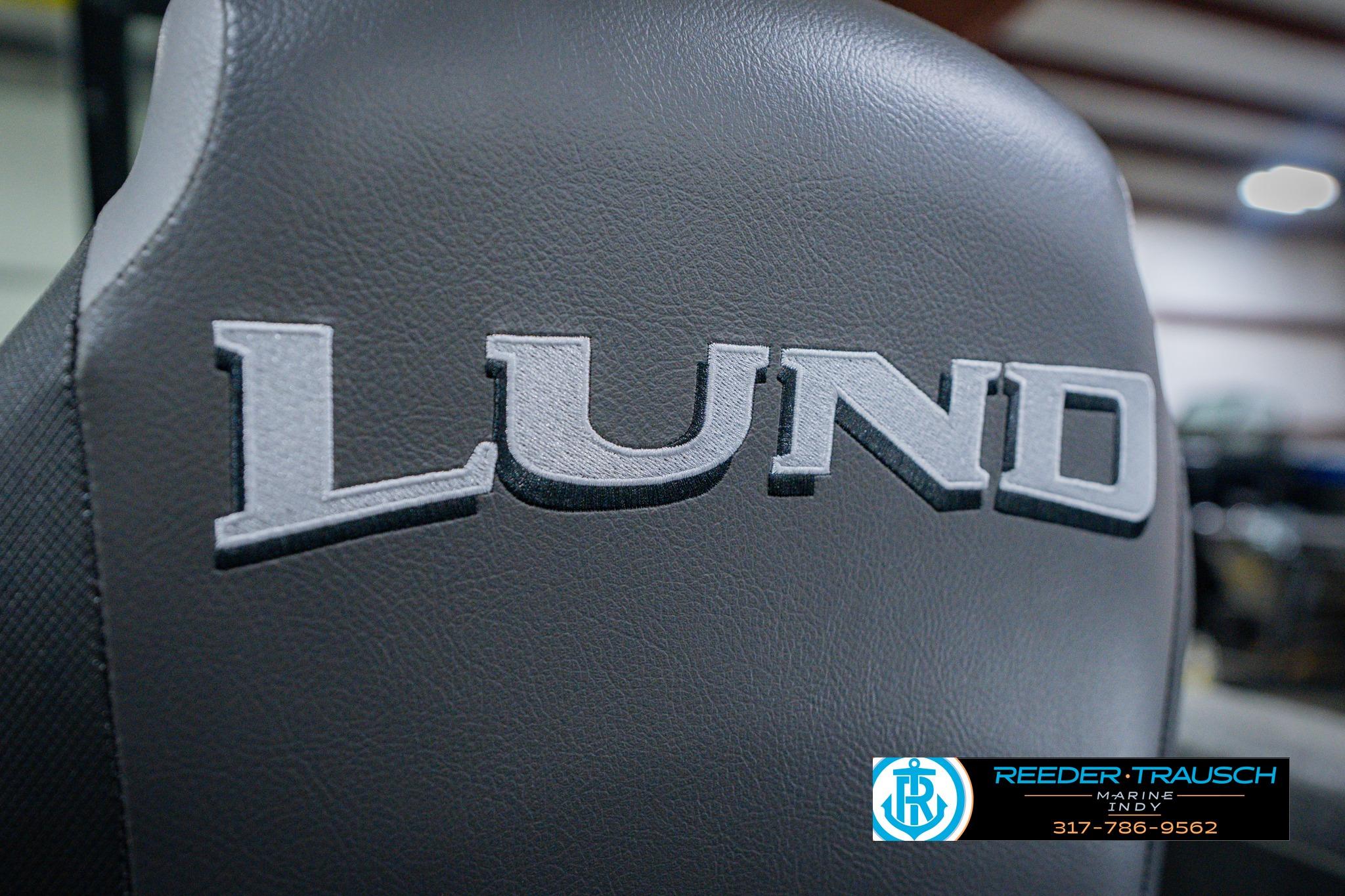 2026 Lund 1775 Impact XS boat seat with logo, featuring Reeder-Trausch Marine contact details.