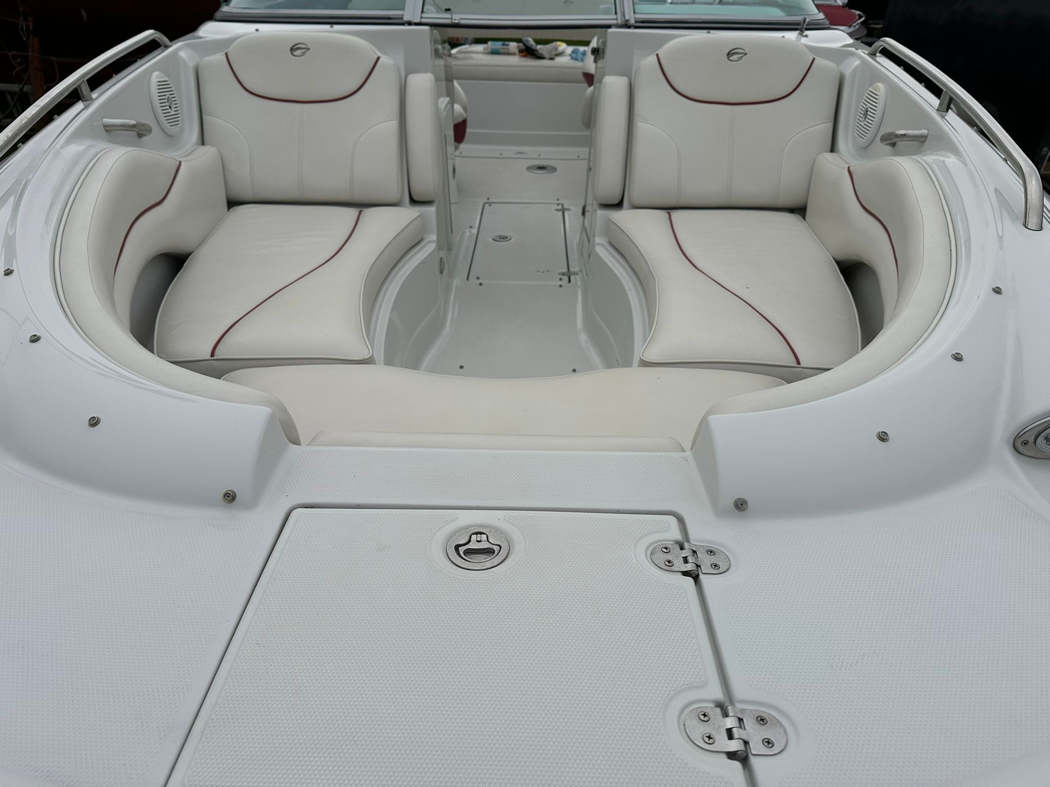 2009 Crownline 220 EX with sleek white seating and modern design.