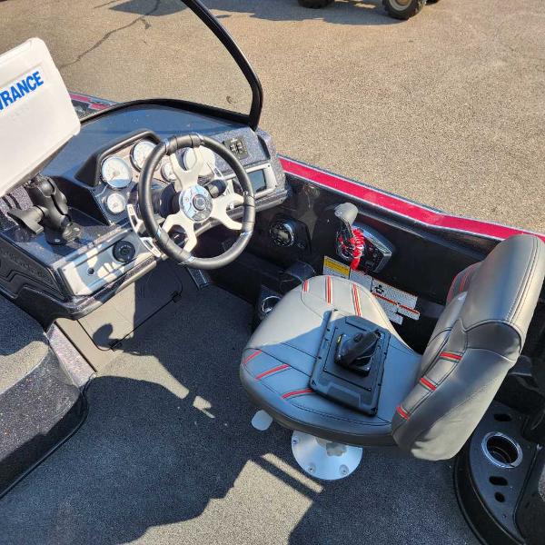 2024 Nitro ZV20 Pro boat cockpit with steering wheel and seat.