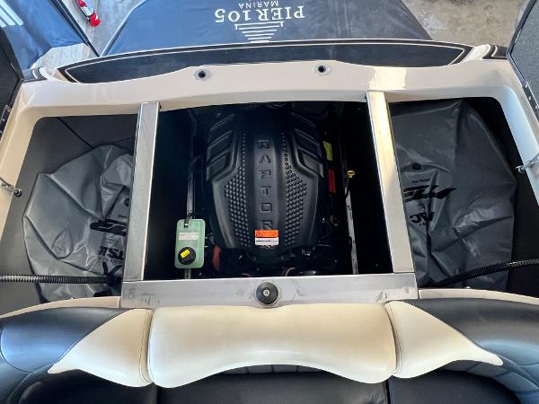 2024 MB F22 Tomcat boat engine compartment with Raptor engine visible.