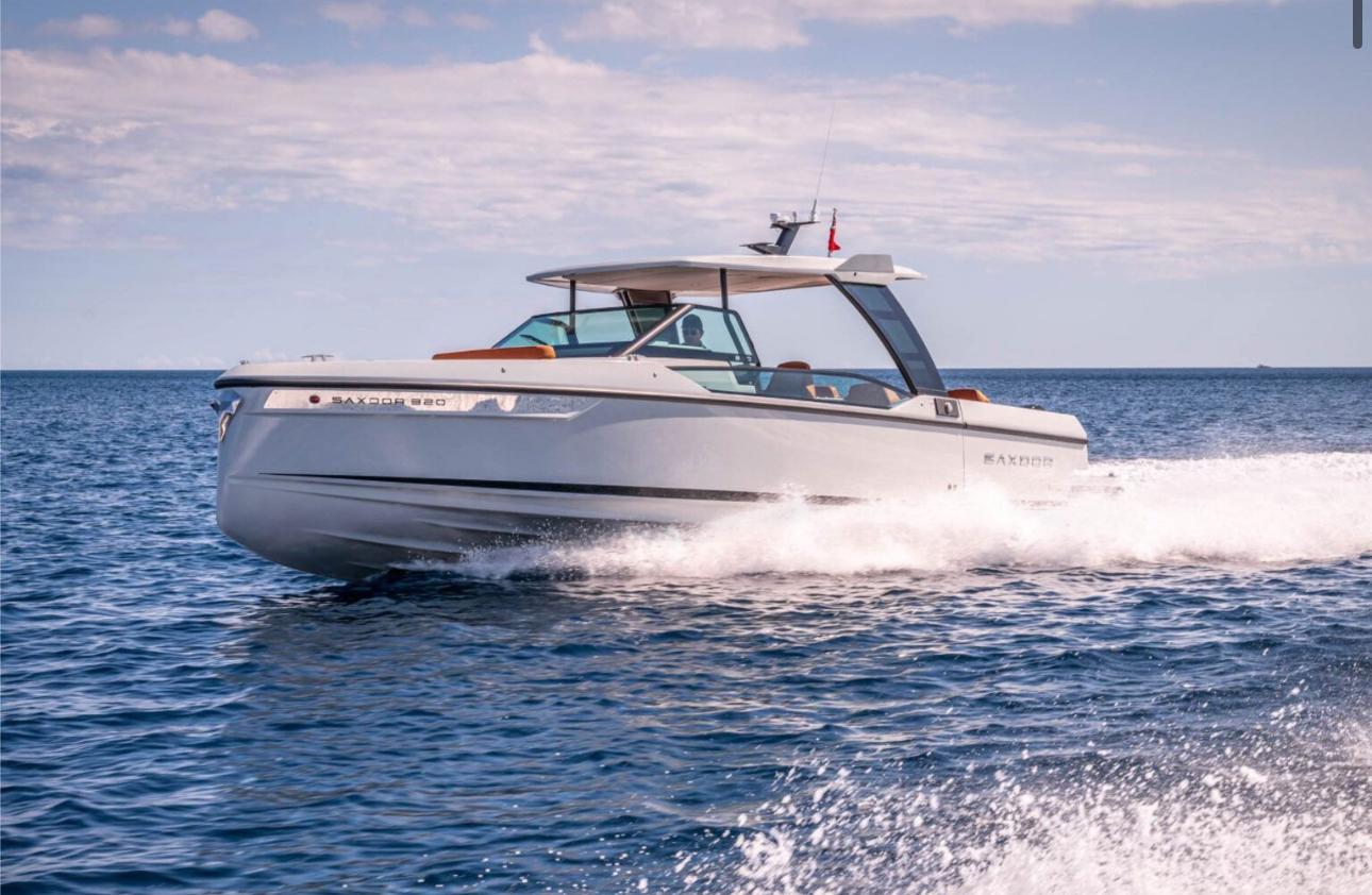2025 Saxdor 320 GTO cruising on open water under a clear sky.