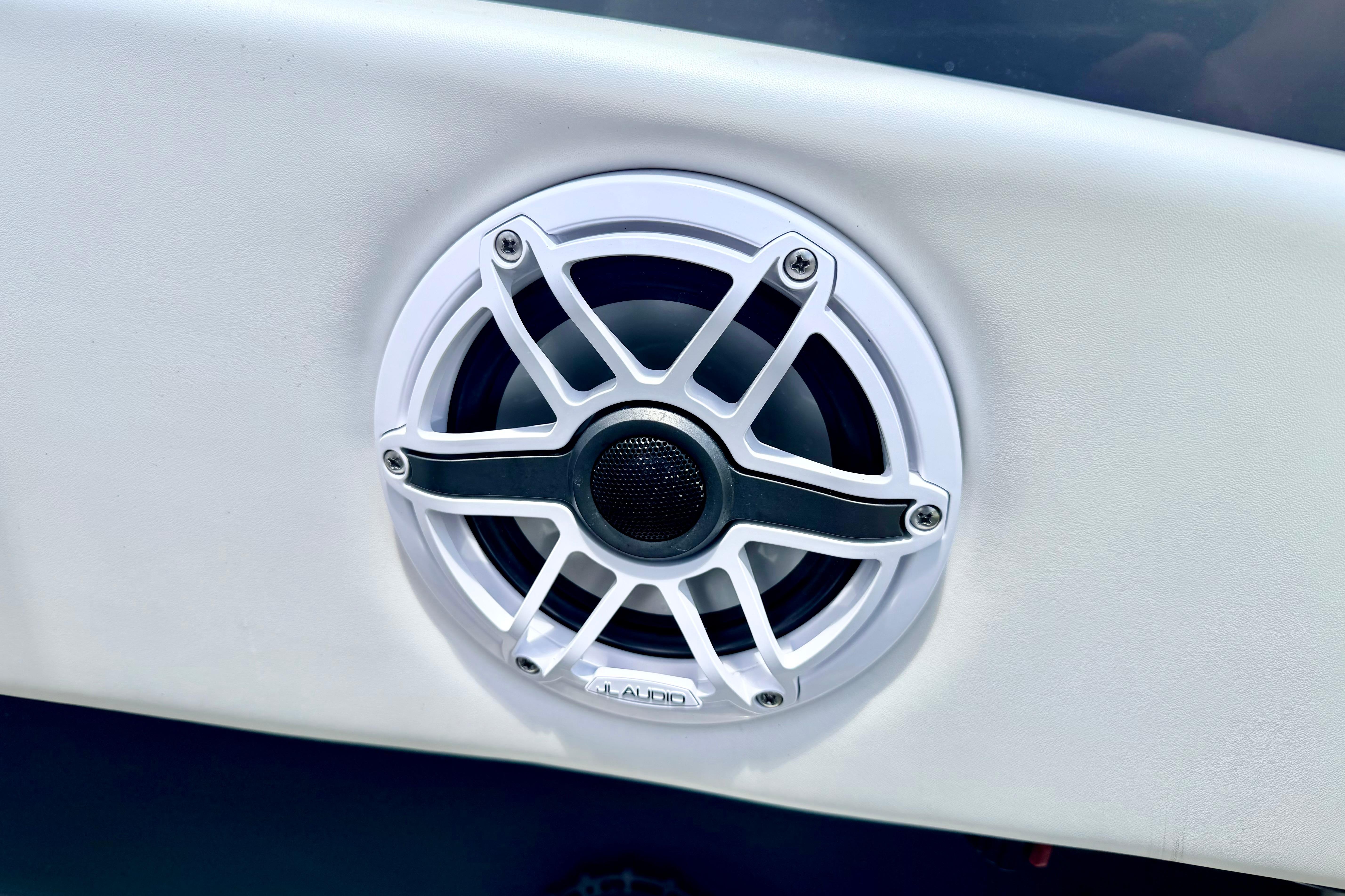 Close-up of a JL Audio speaker on a 2018 Glastron GT 185 boat.