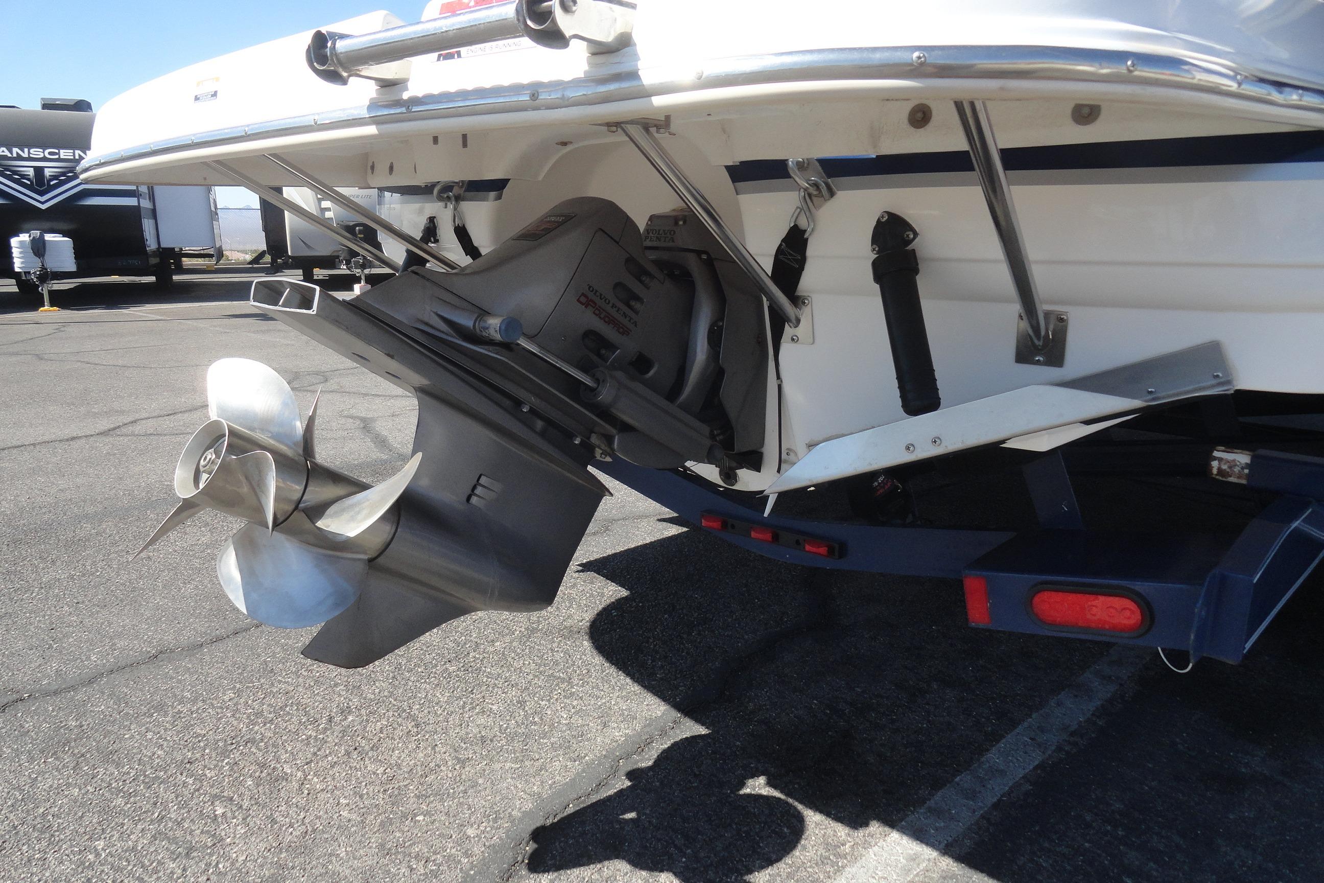Rear view of a 2001 Chaparral 265 SSi boat showing the propeller and outdrive.