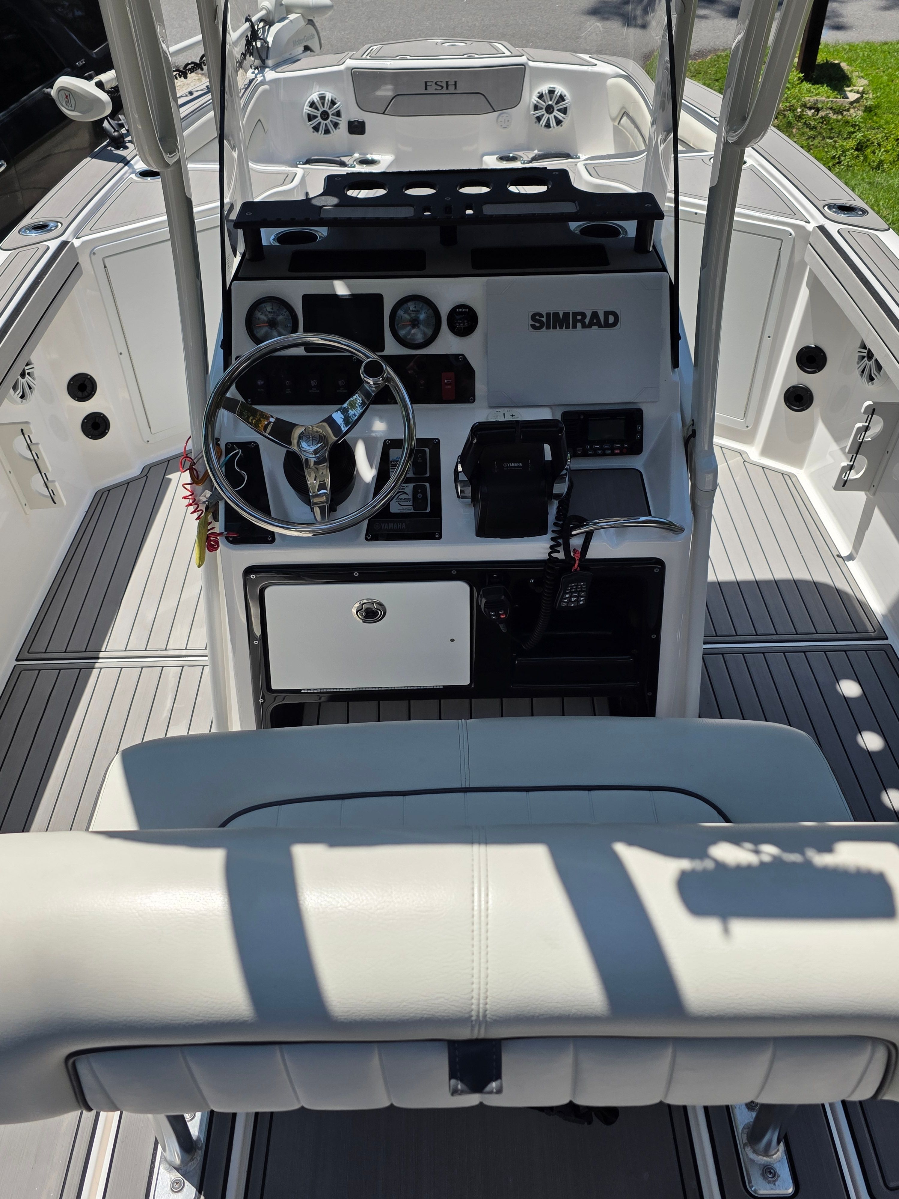 Interior view of a 2020 Yamaha 210 FSH Sport boat.