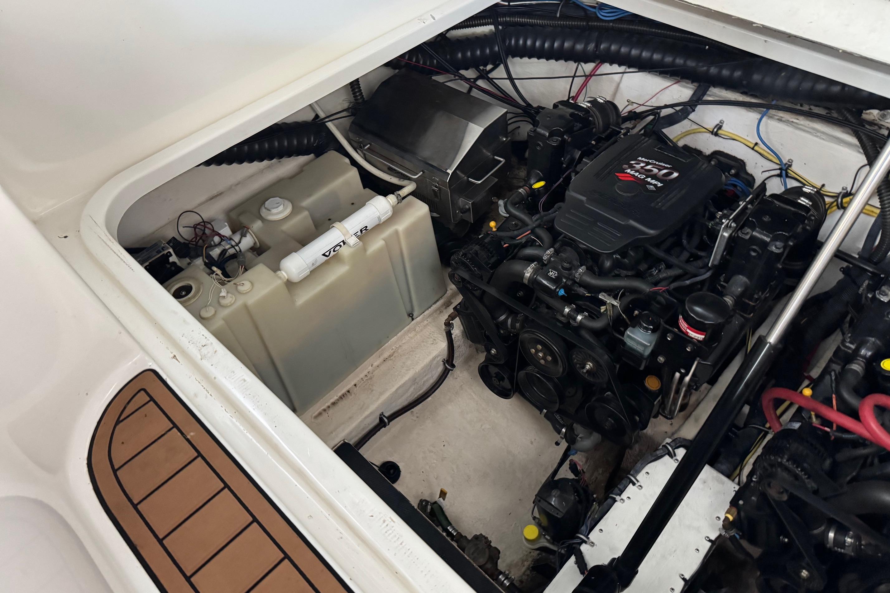 Engine compartment of a 2006 Chaparral 330 Signature boat, featuring a Volvo Penta engine.