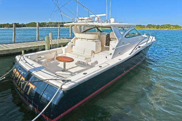2008 Tiara Yachts 4200 Open docked, featuring spacious deck and sleek design.