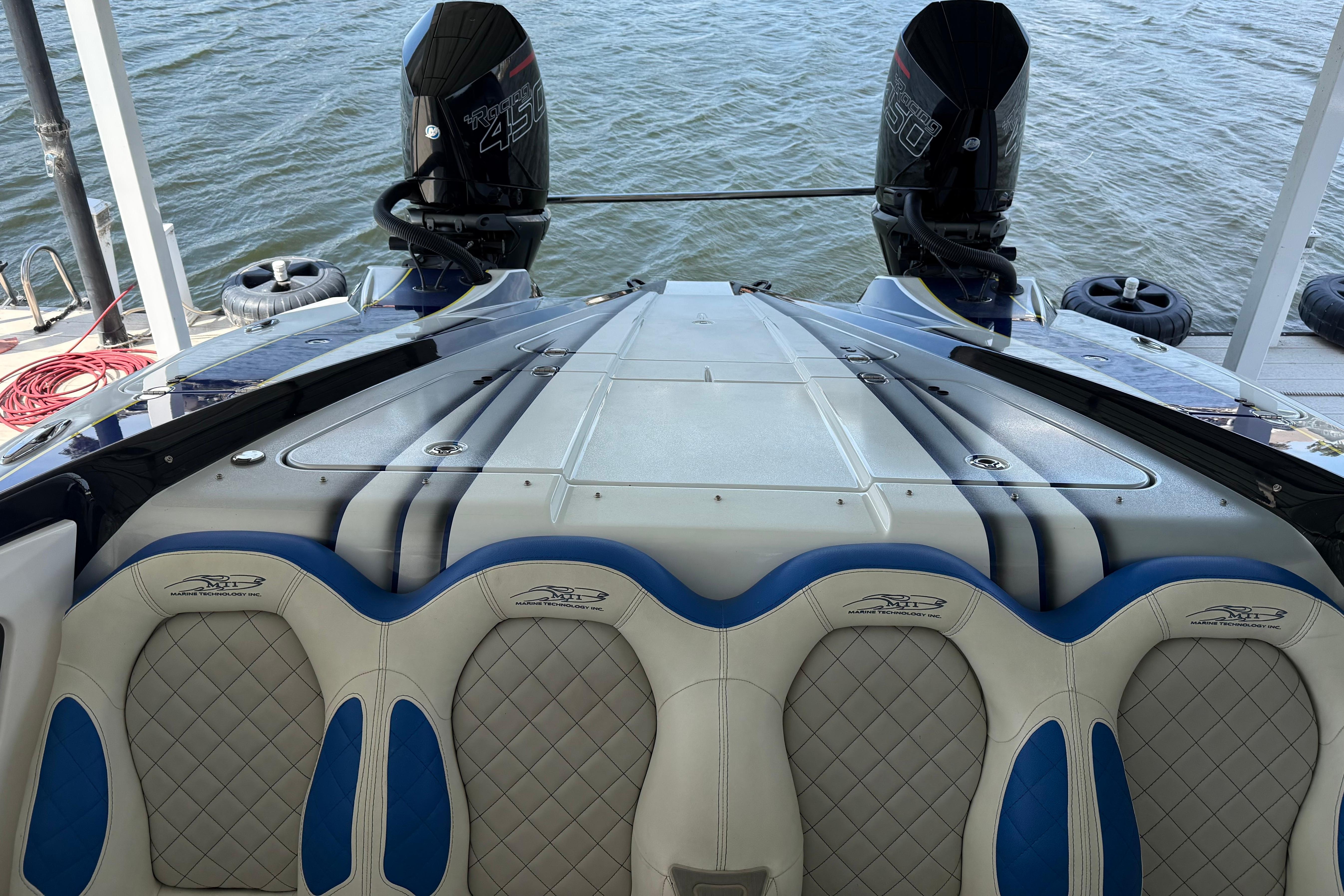 2018 MTI 340X boat with dual outboard engines.