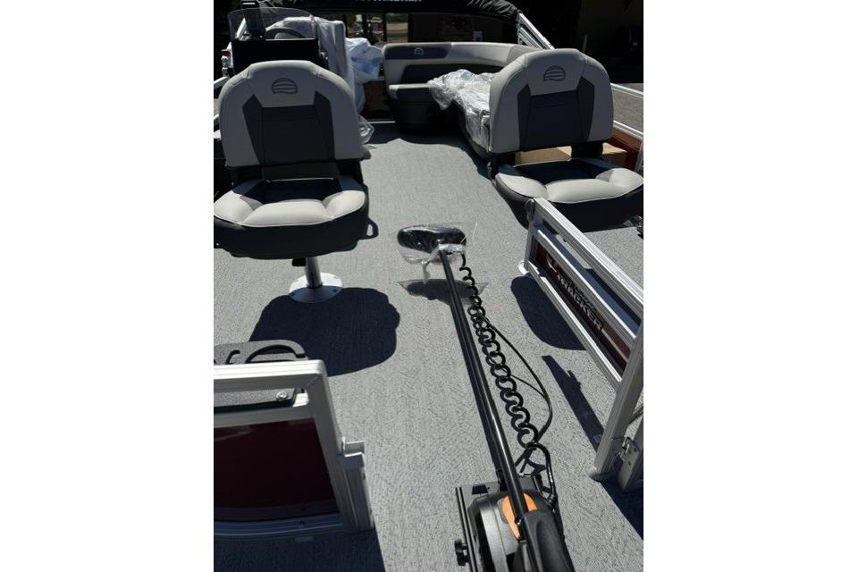 2026 Sun Tracker Bass Buggy 16 XL Select interior with seating and fishing equipment.