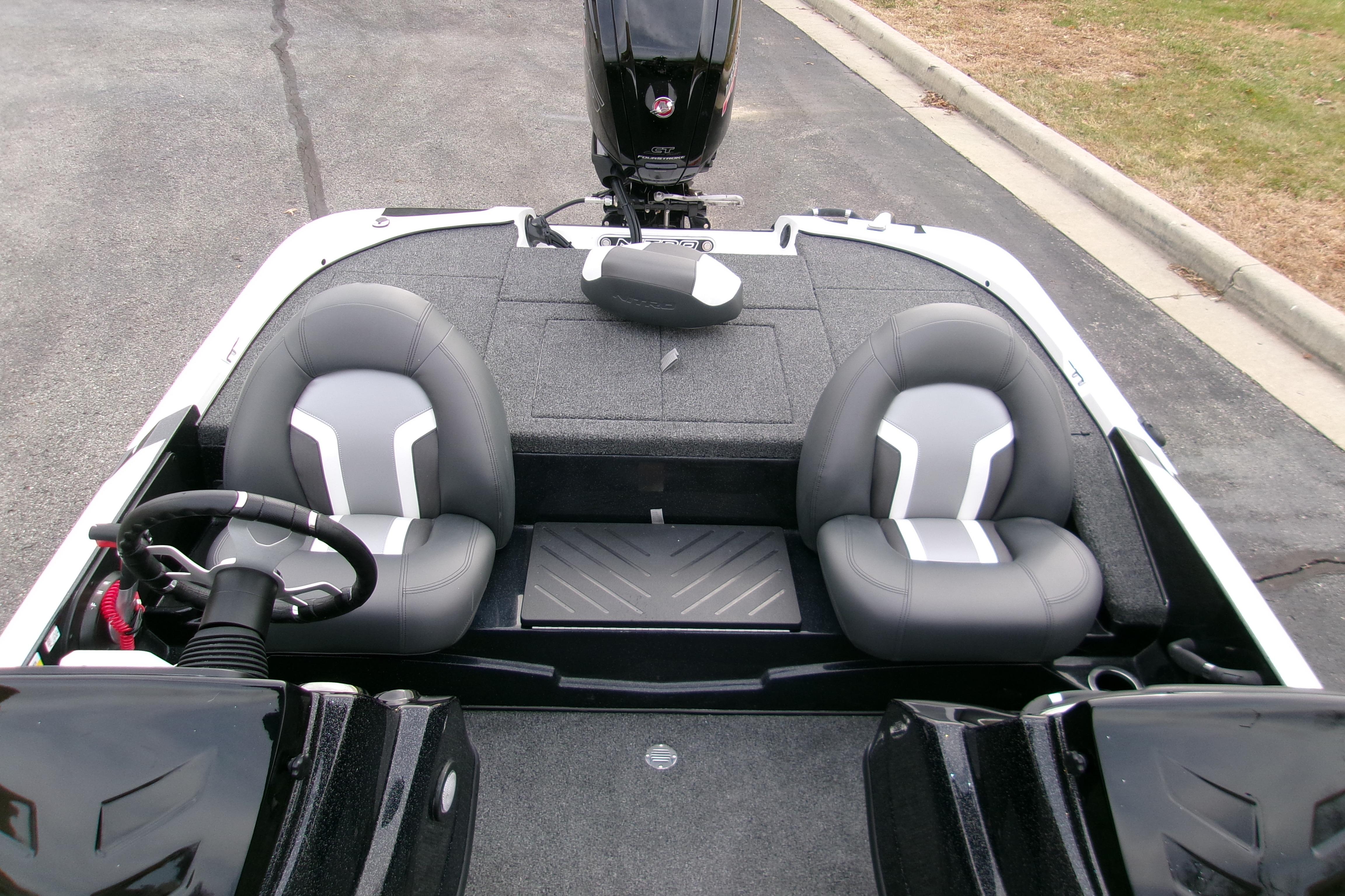Interior of 2026 Nitro Z17 boat with dual gray seats and steering wheel.