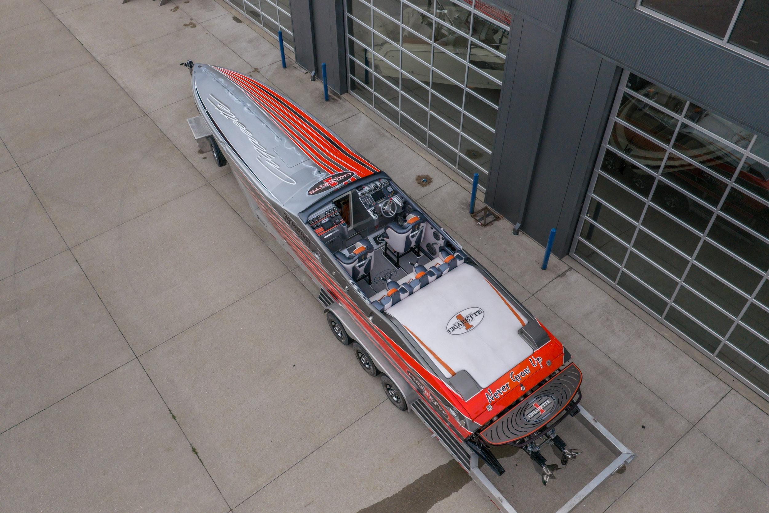 2006 Cigarette 39' Top Gun Unlimited speedboat on trailer, aerial view.