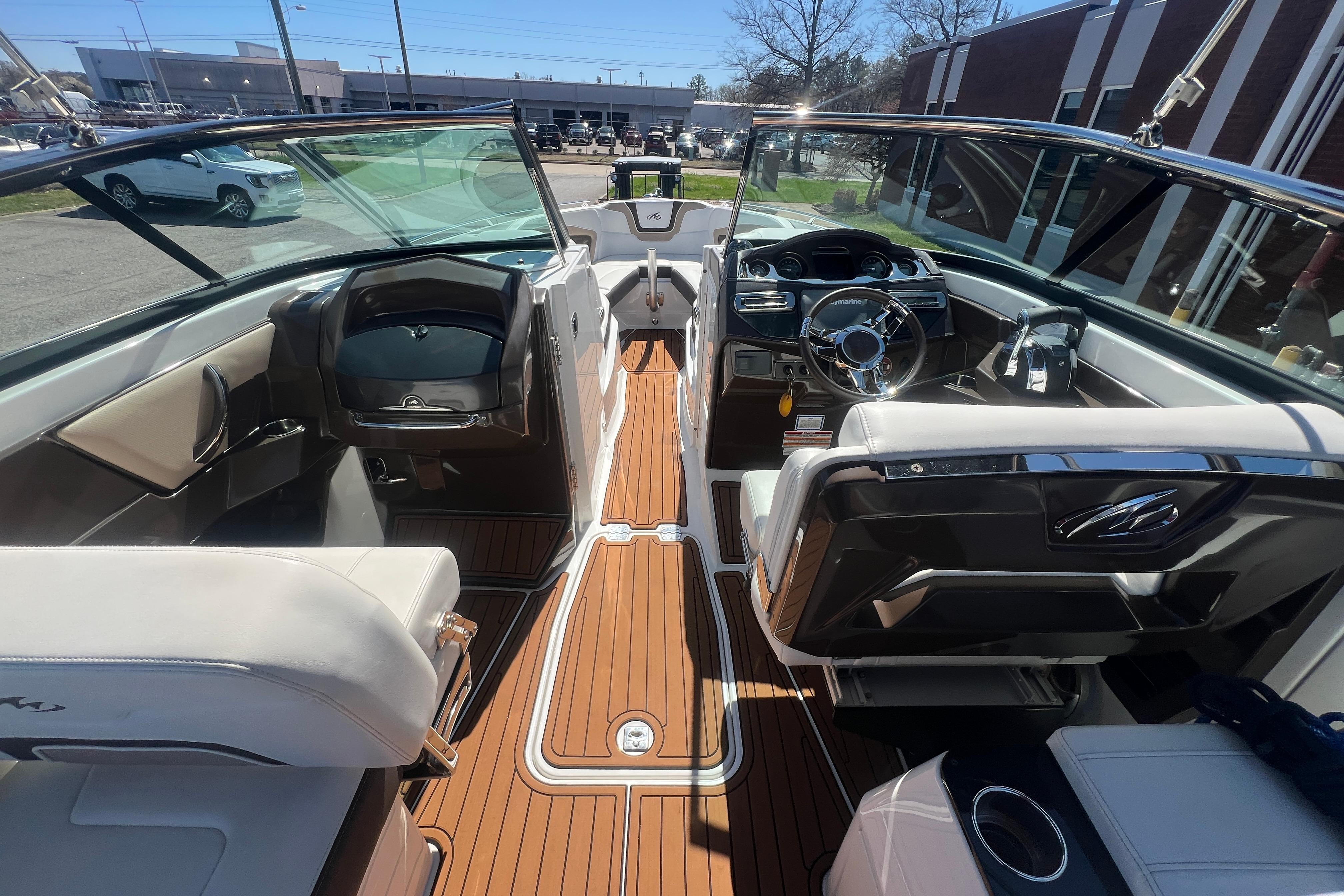 Interior view of a 2017 Monterey 298SS Super Sport boat with luxurious seating and dashboard.