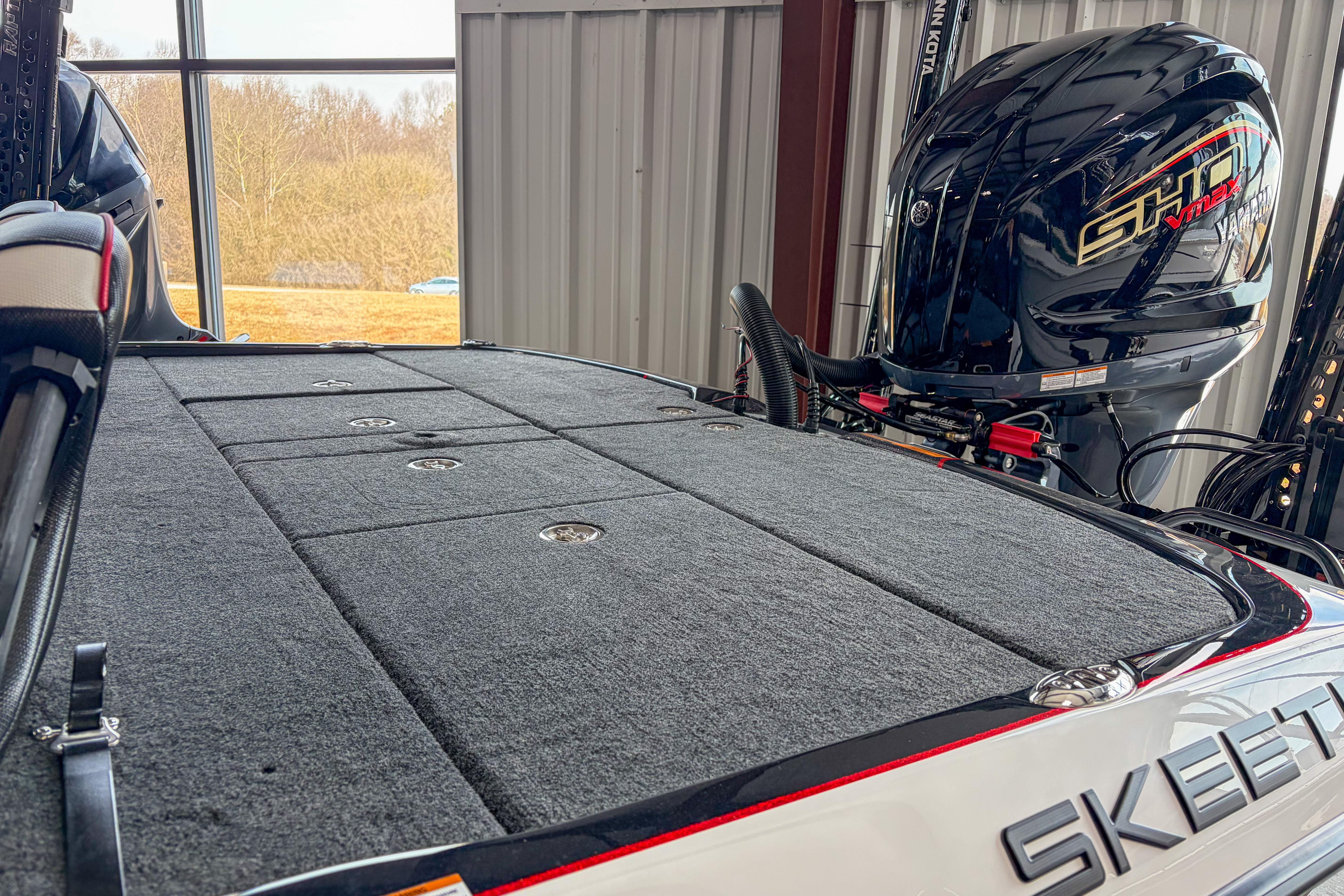 2026 Skeeter FXR20 FLEX boat with Yamaha engine in a storage facility.