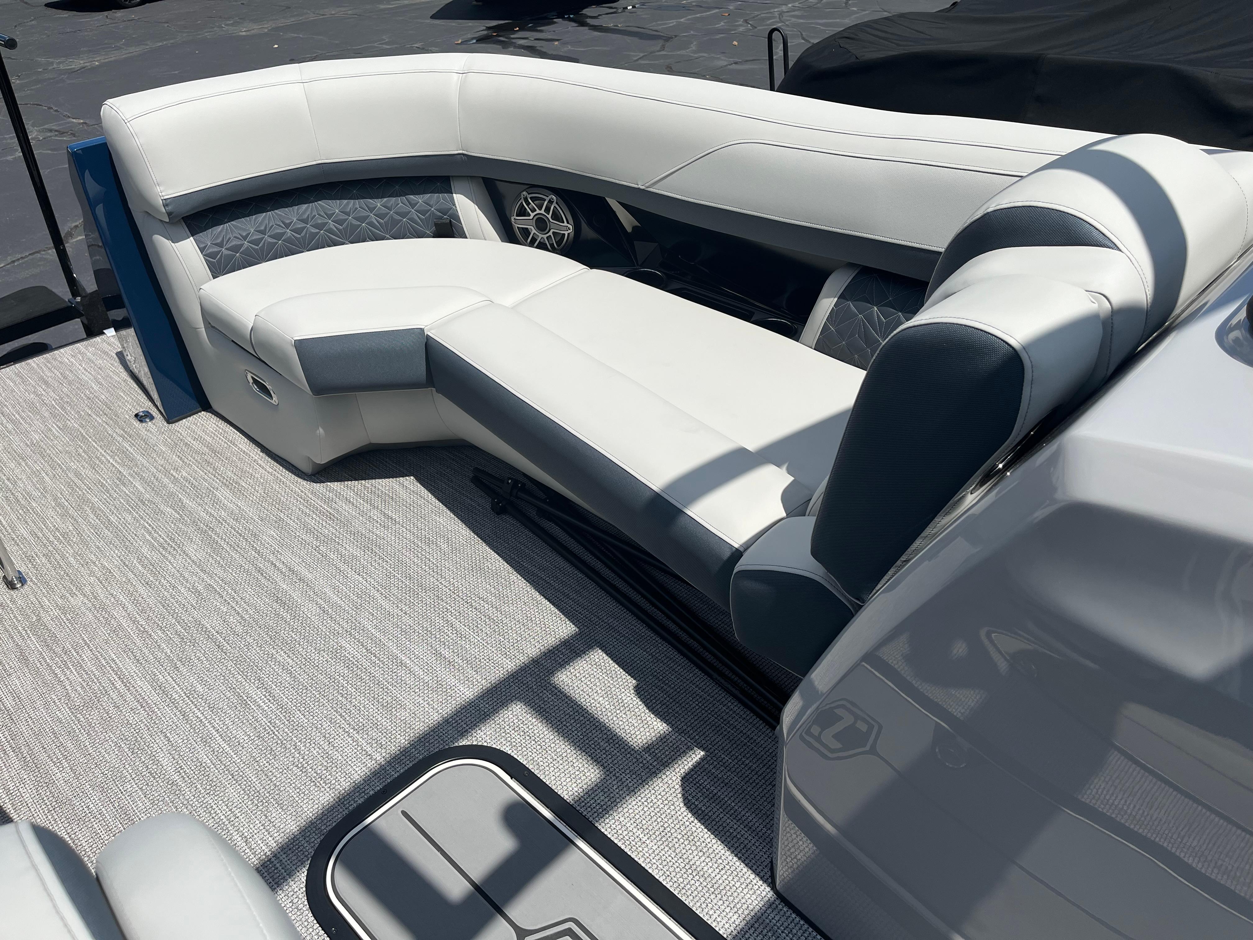 Luxurious seating on 2026 Harris Grand Mariner 230 pontoon boat, featuring elegant upholstery.