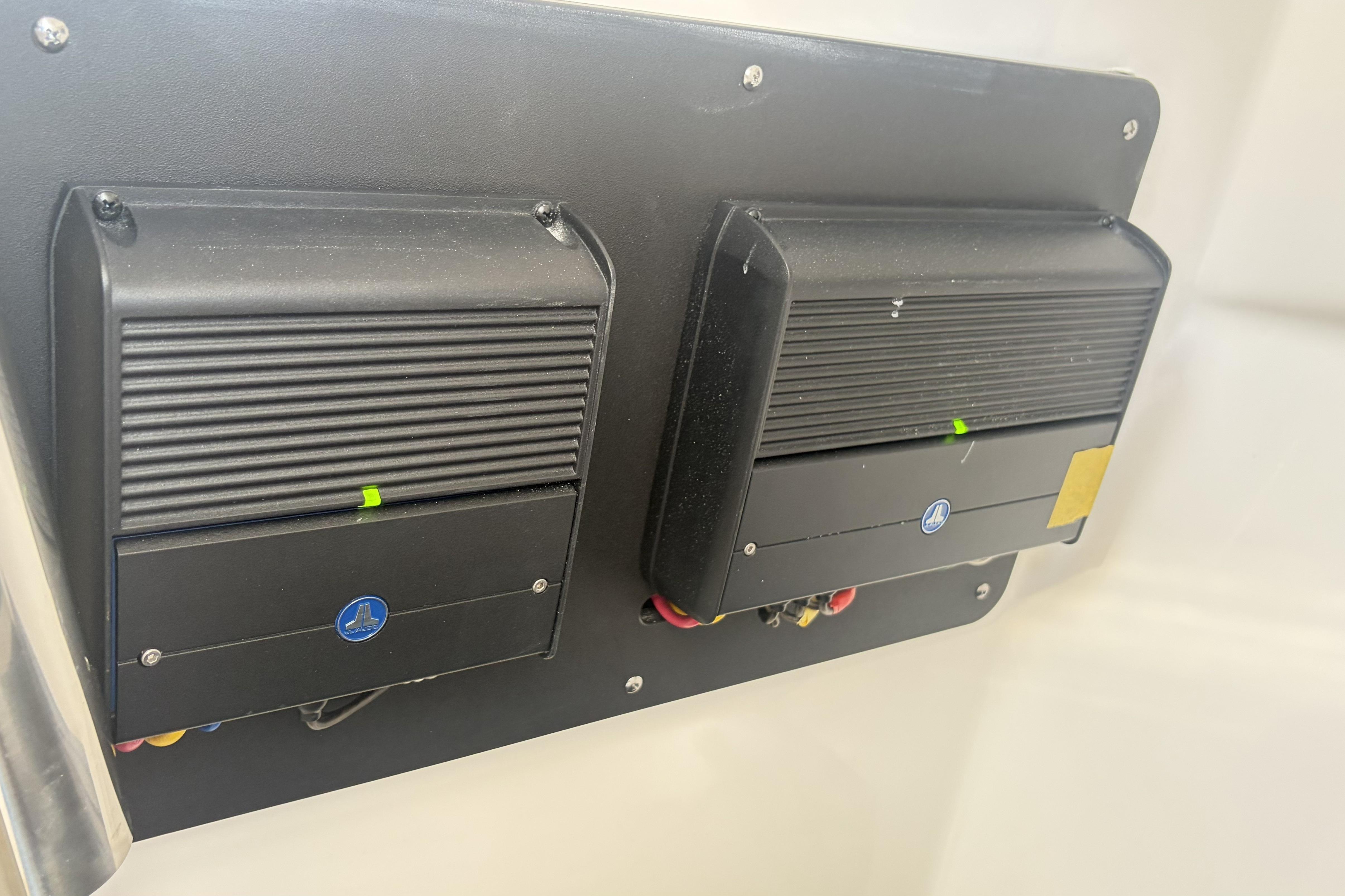 Dual electronic components on Blackfin 272 DC, 2025 model, mounted on a black panel.