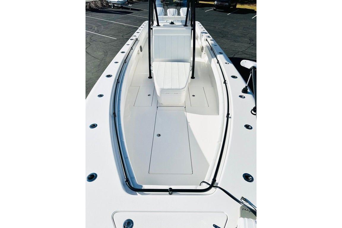 2025 Contender 35 ST boat, sleek white deck, spacious layout, modern design.