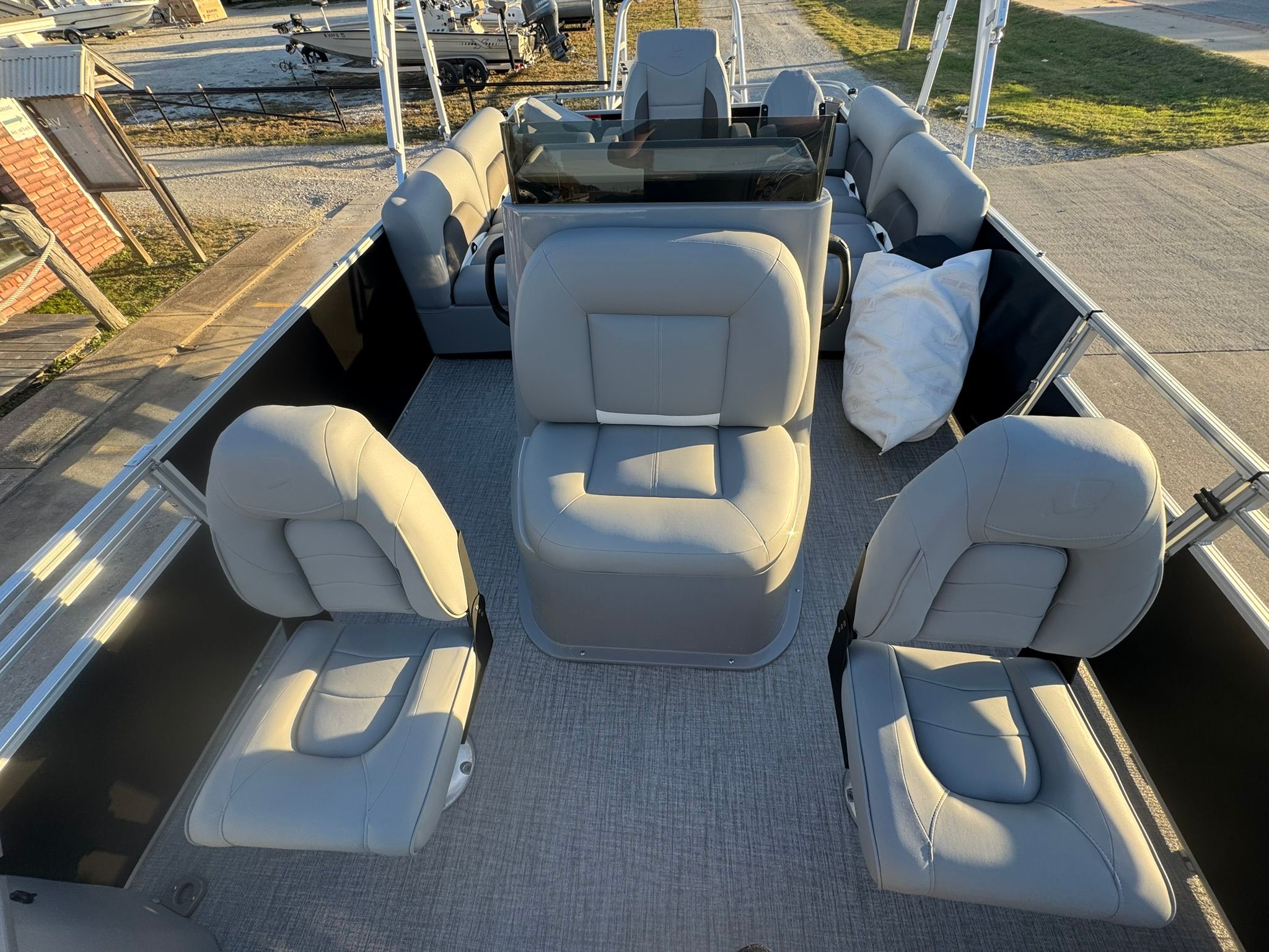 Interior of 2026 Landau Alure 21CC Fish with gray seating.