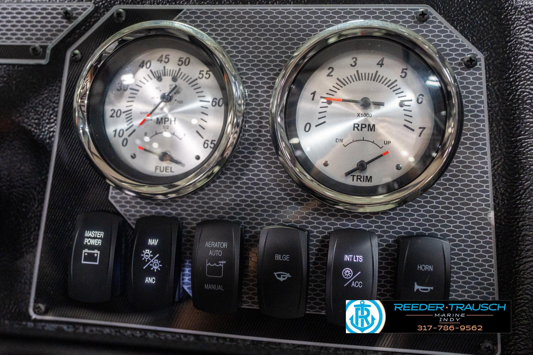 Dashboard of 2026 Lund 1700 Explorer Sport with gauges and control switches.