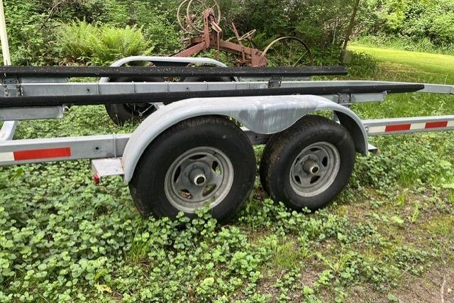 Trailer for 2008 Ranger 25 on grassy area.