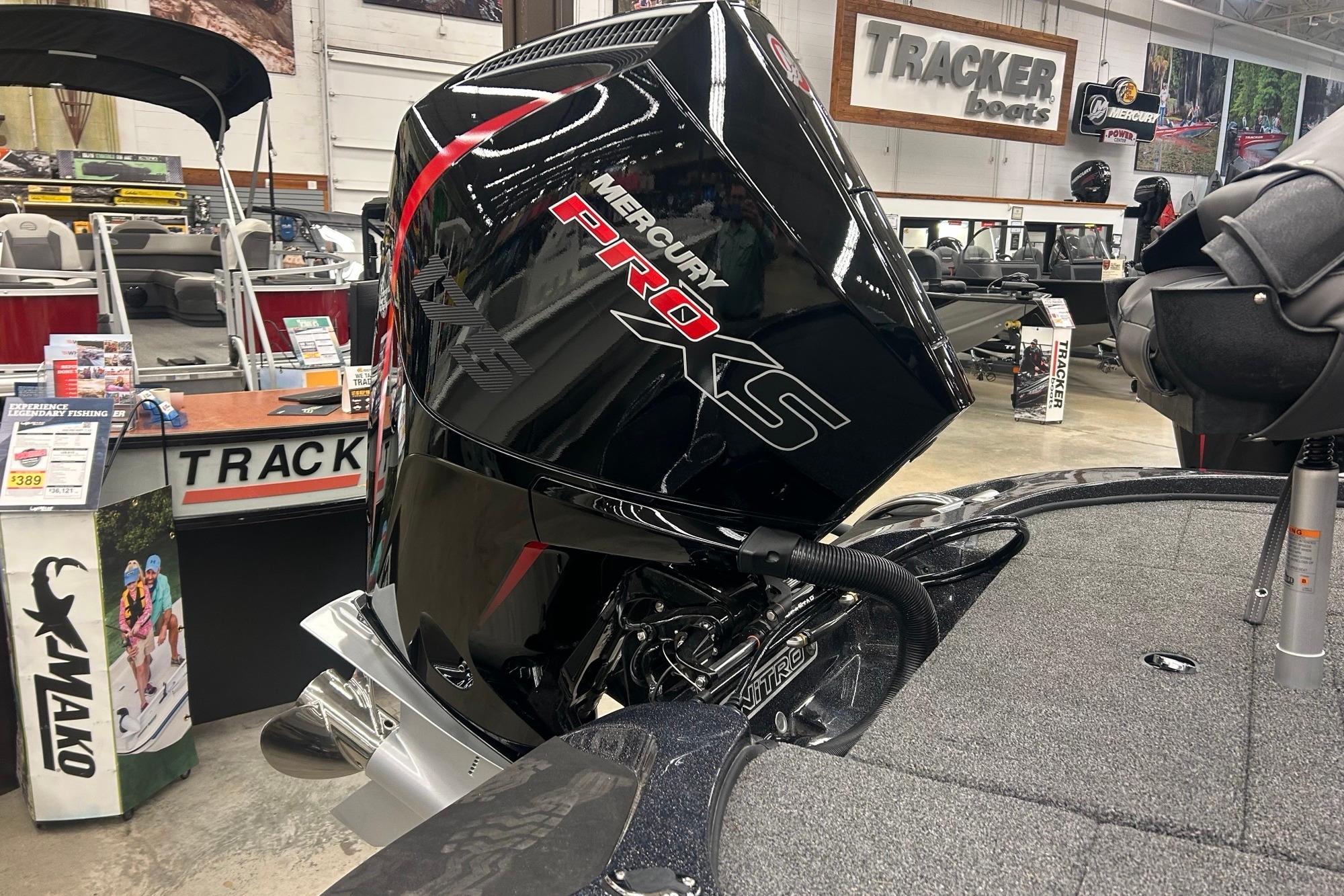 2026 Nitro Z18 Pro boat with Mercury Pro XS engine in showroom.
