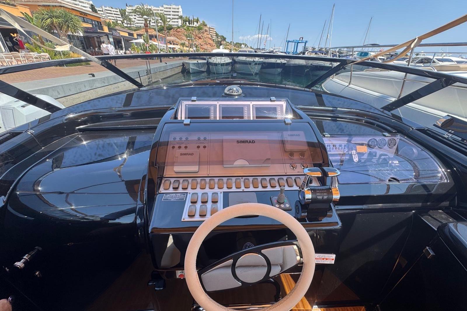 Cockpit of 2012 Riva Rivarama Super 44 yacht with modern navigation controls.