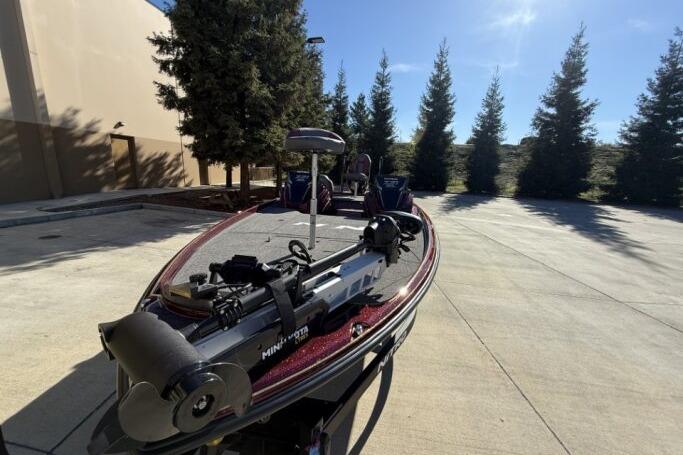 2026 Nitro Z21 XL Pro boat parked outdoors, featuring a Minn Kota trolling motor.