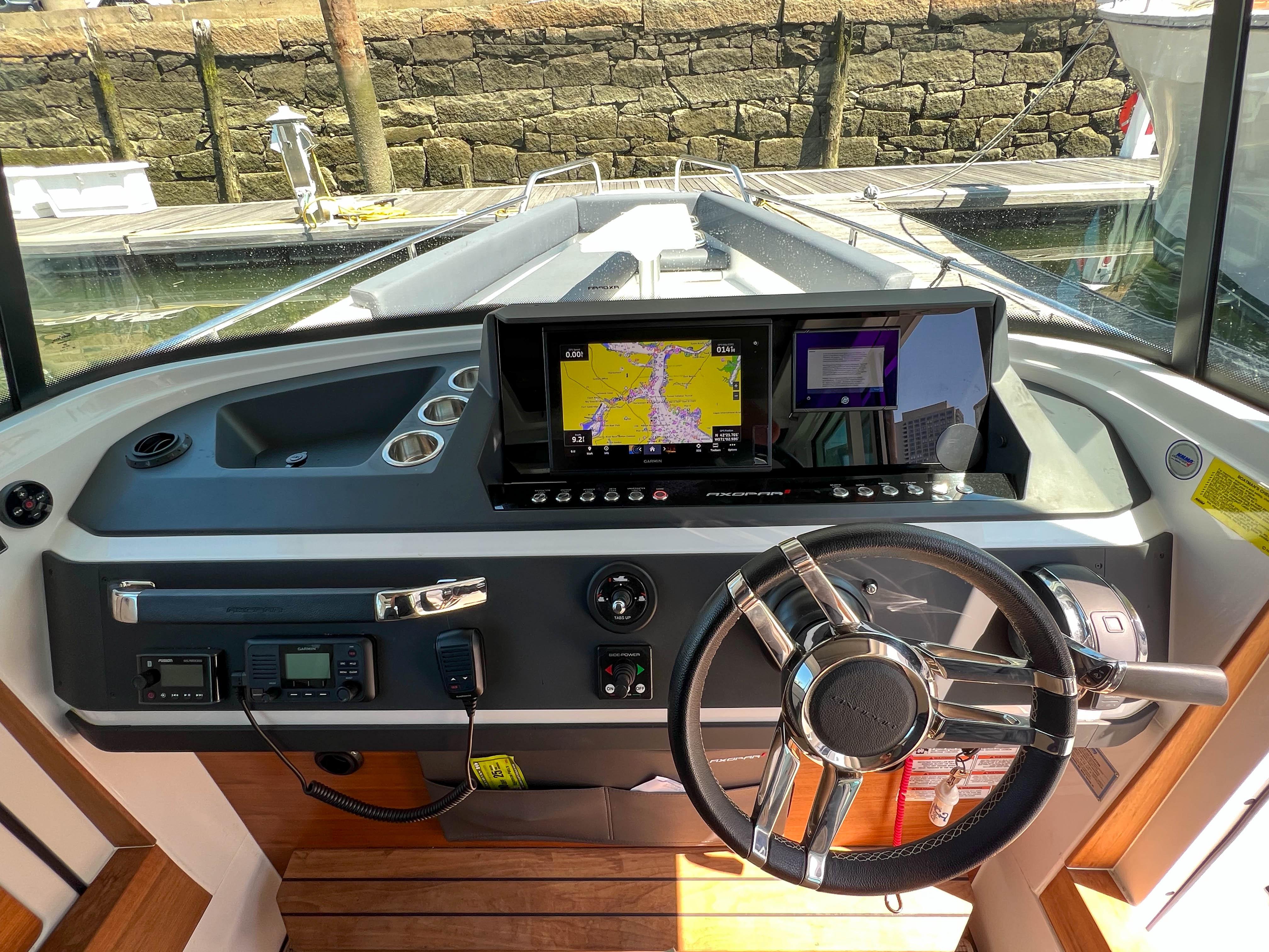 2020 Axopar 28 Cabin helm with navigation system.