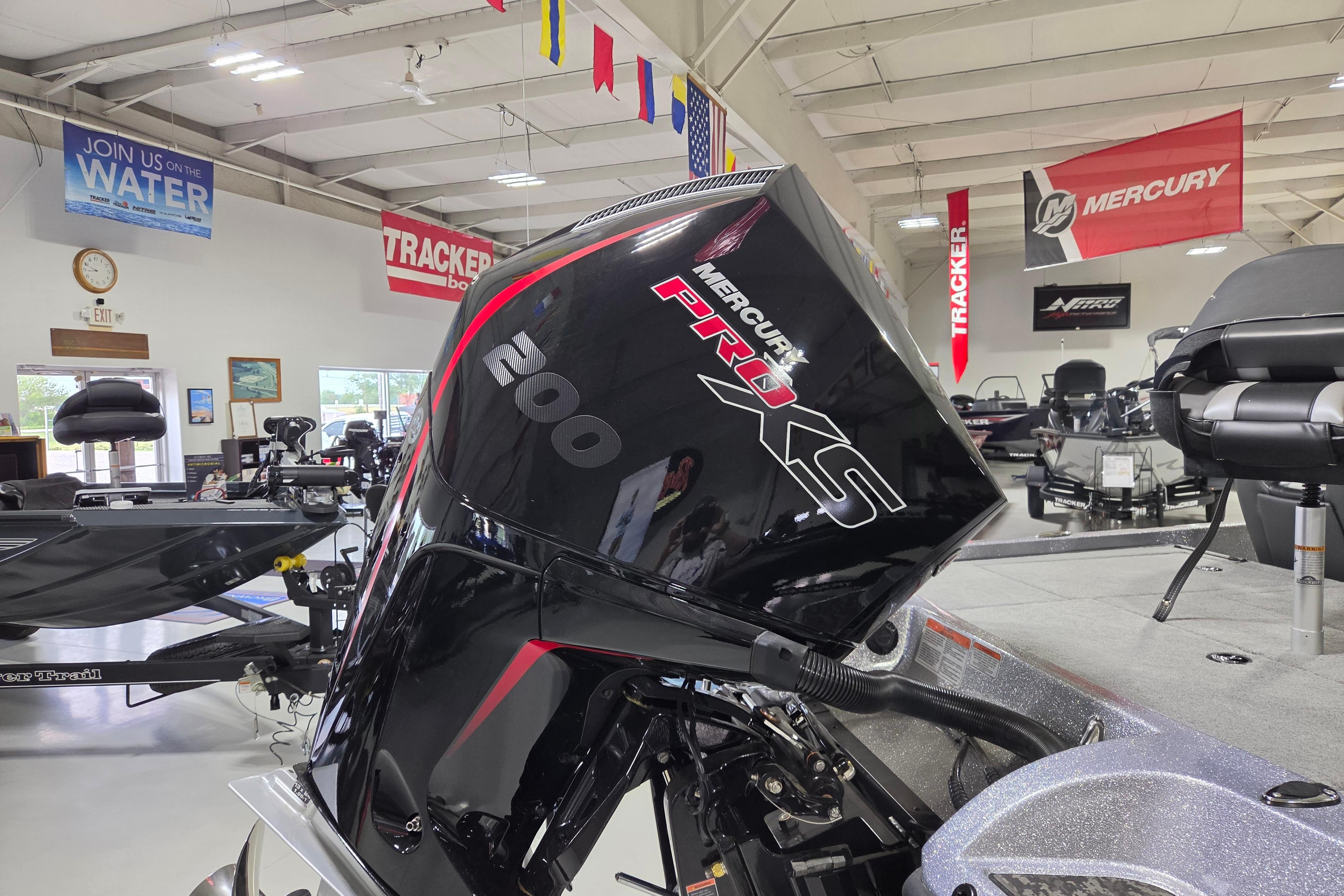 2026 Nitro Z19 XL boat with Mercury Pro XS 200 engine in showroom.