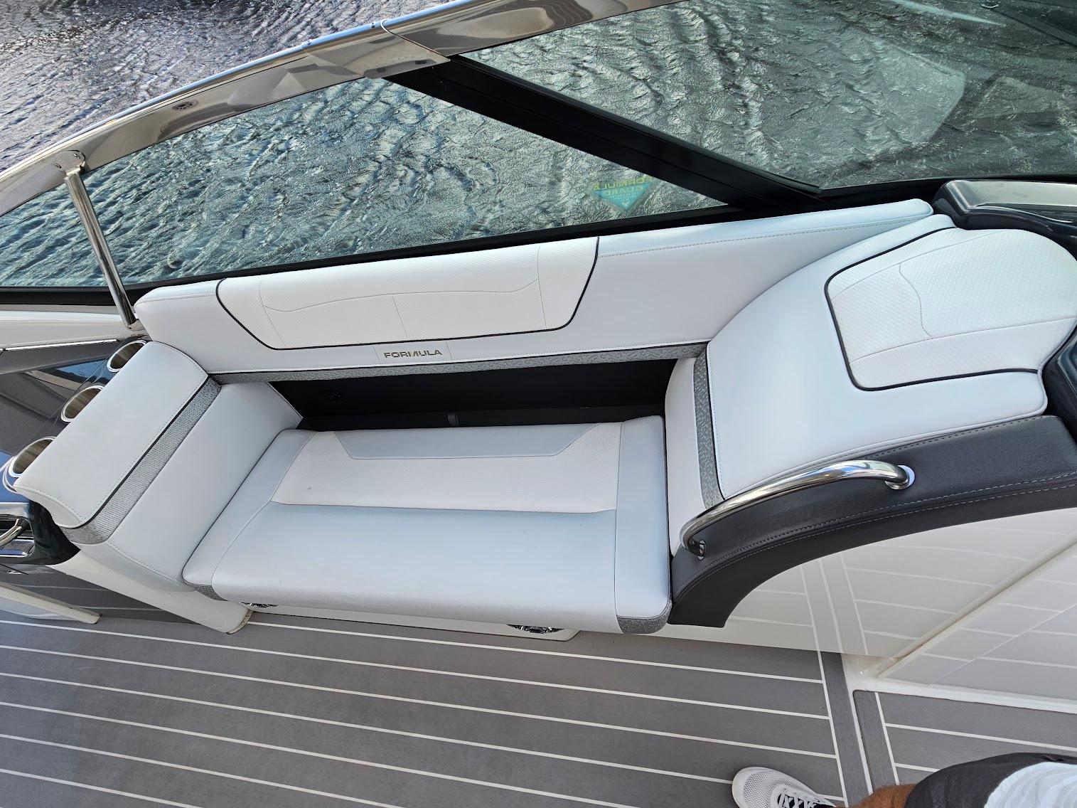 2023 Formula 350 Crossover Bowrider interior with sleek white seating and modern design.