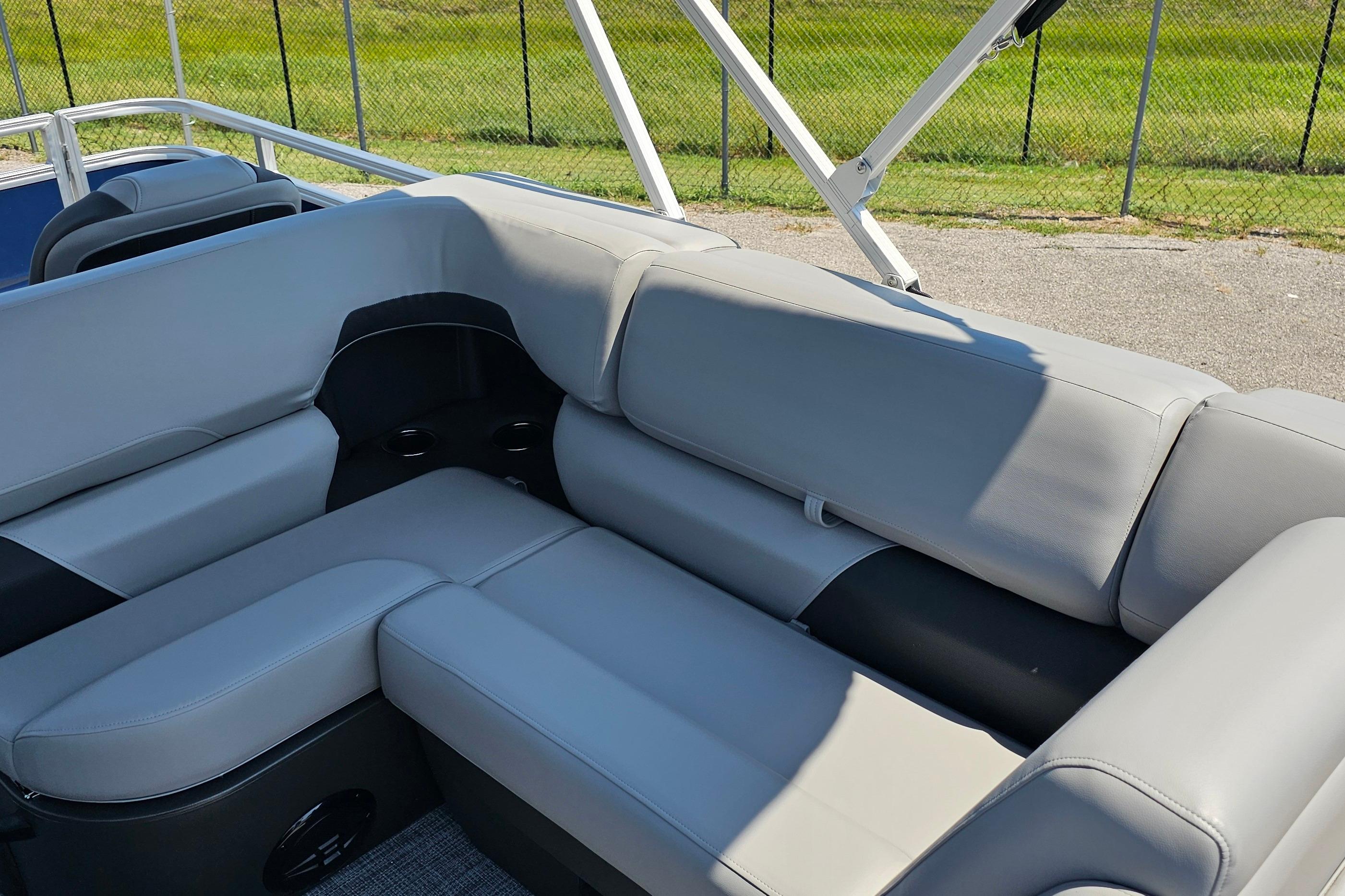 2026 Sun Tracker SportFish 20 DLX boat interior with gray seating and sleek design.