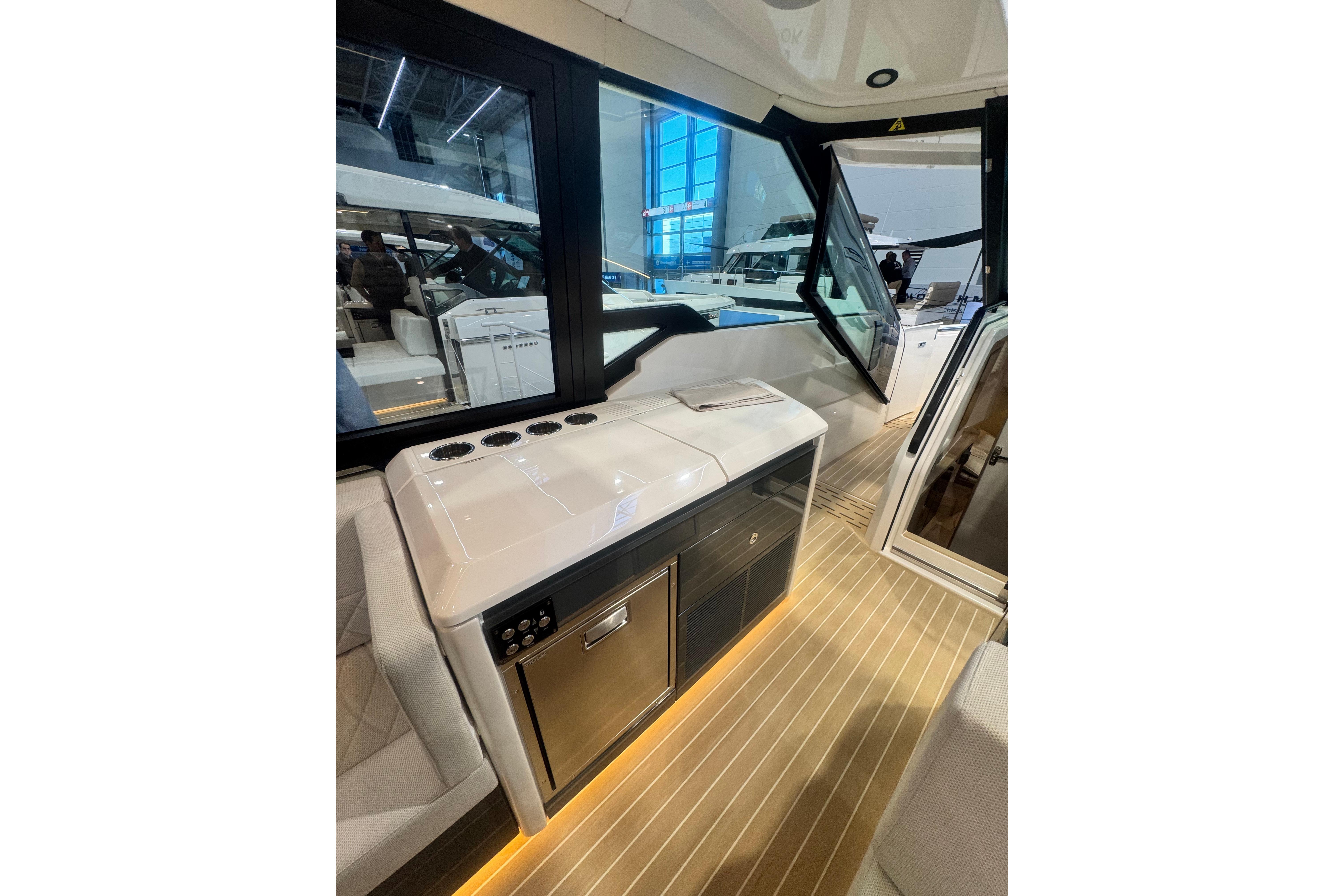 2026 Saxdor 400 GTC interior with modern kitchenette and sleek design.