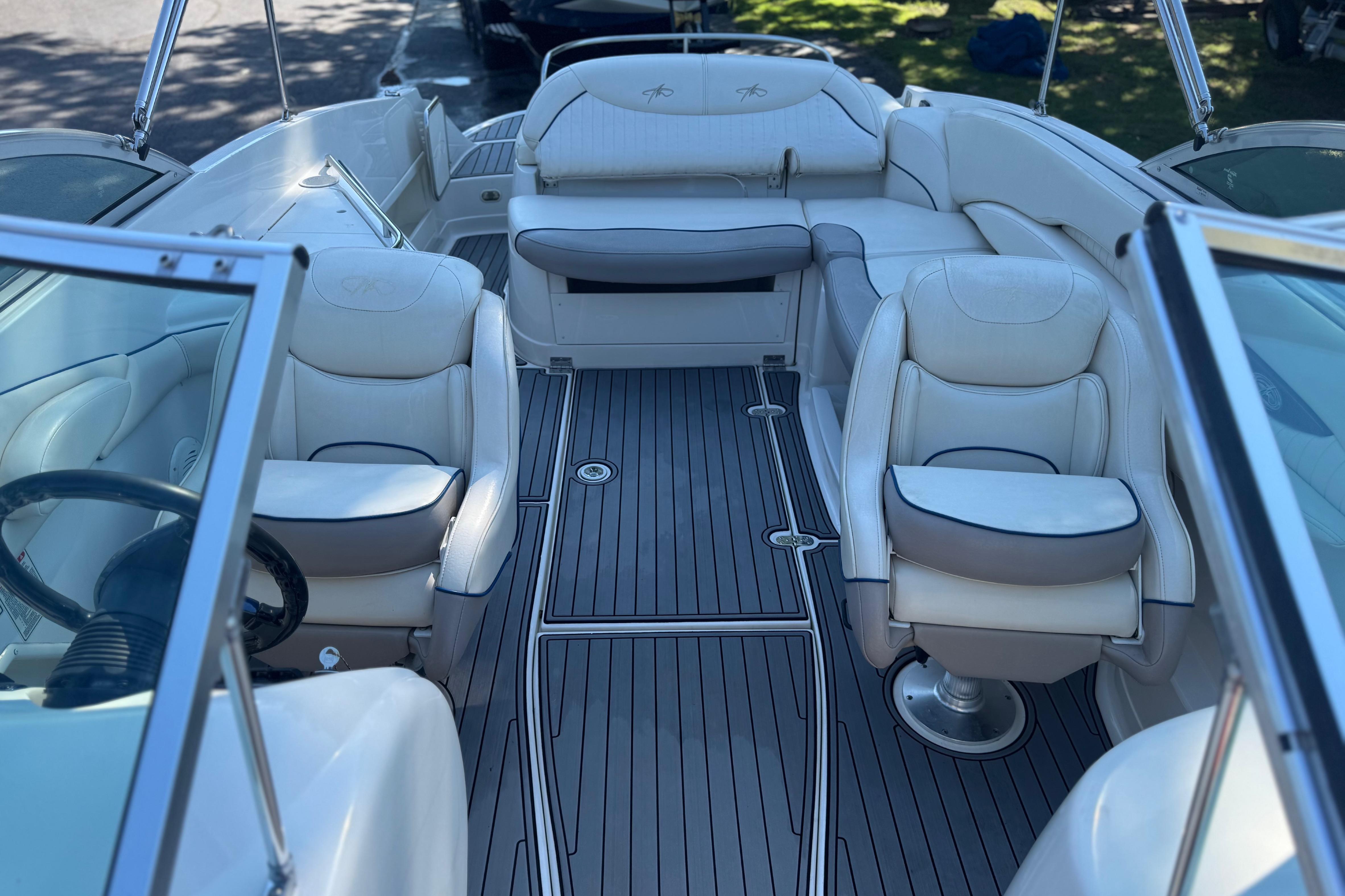 Luxurious interior of a Monterey 268SS Super Sport boat with plush seating and sleek design.