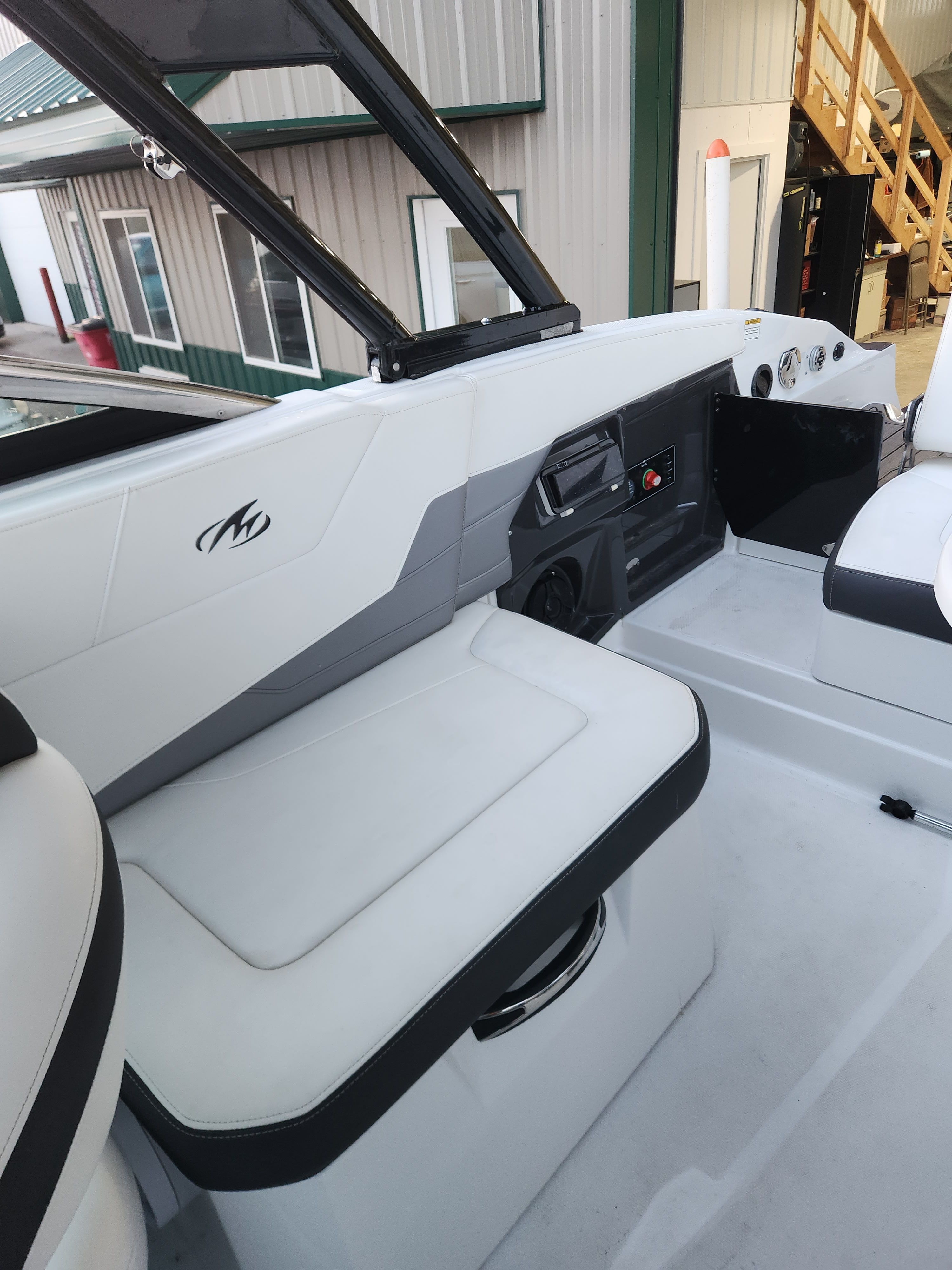 Interior of a 2015 Monterey 268SSC boat with seating area.