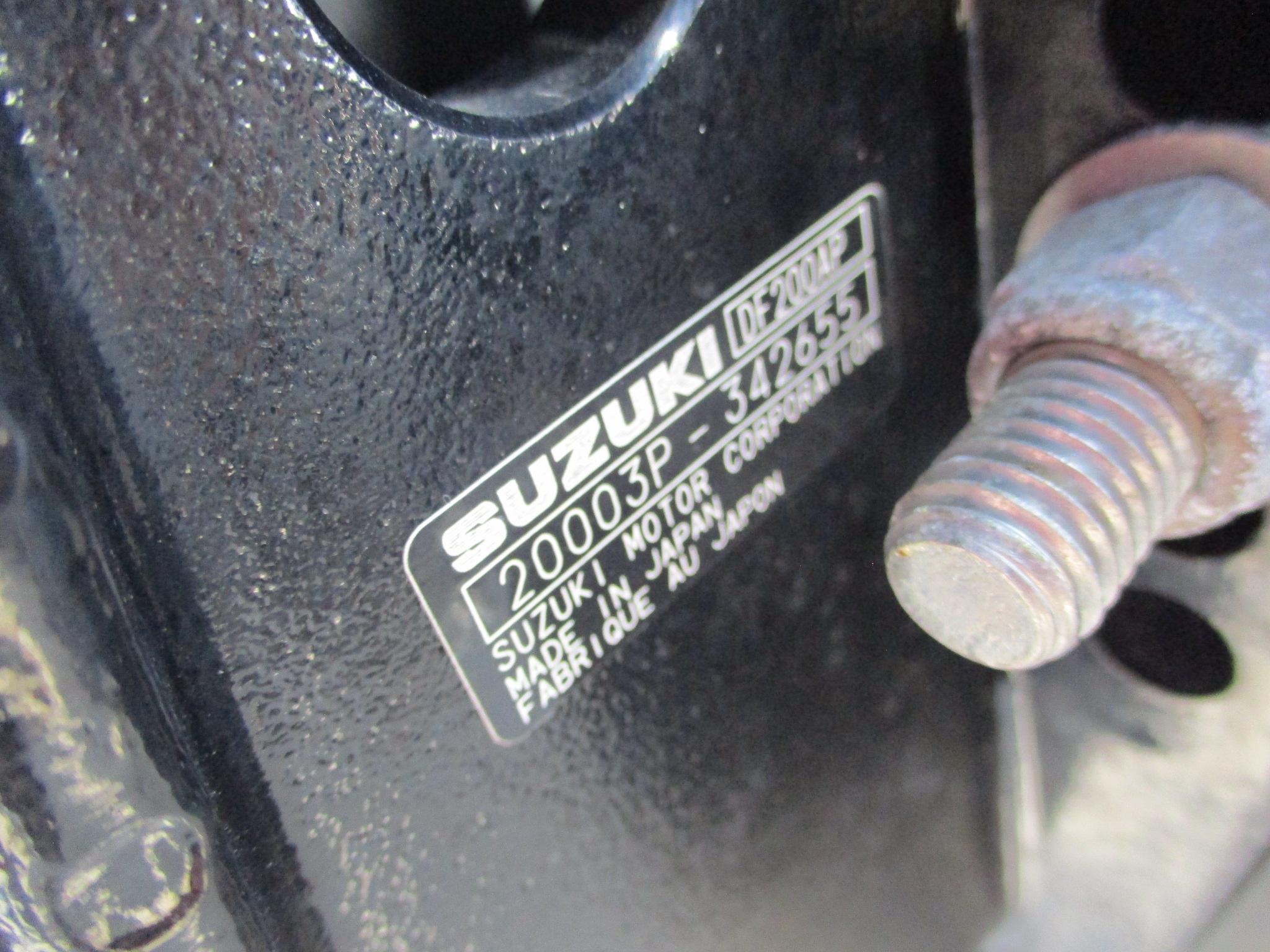 Close-up of Suzuki engine label on 2024 Blue Wave 2800 Makaira boat.