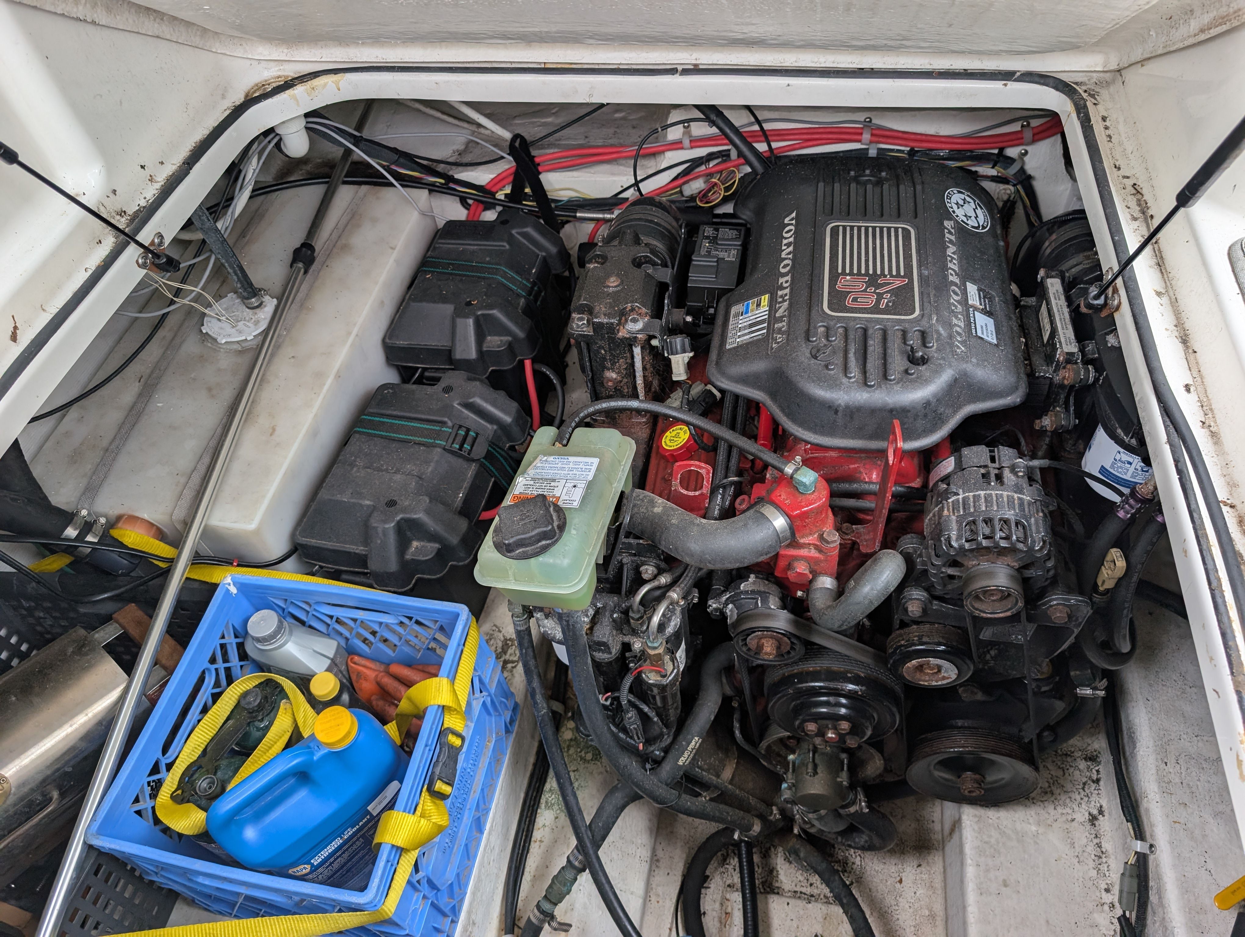 2006 Glastron GS boat engine compartment with supplies.
