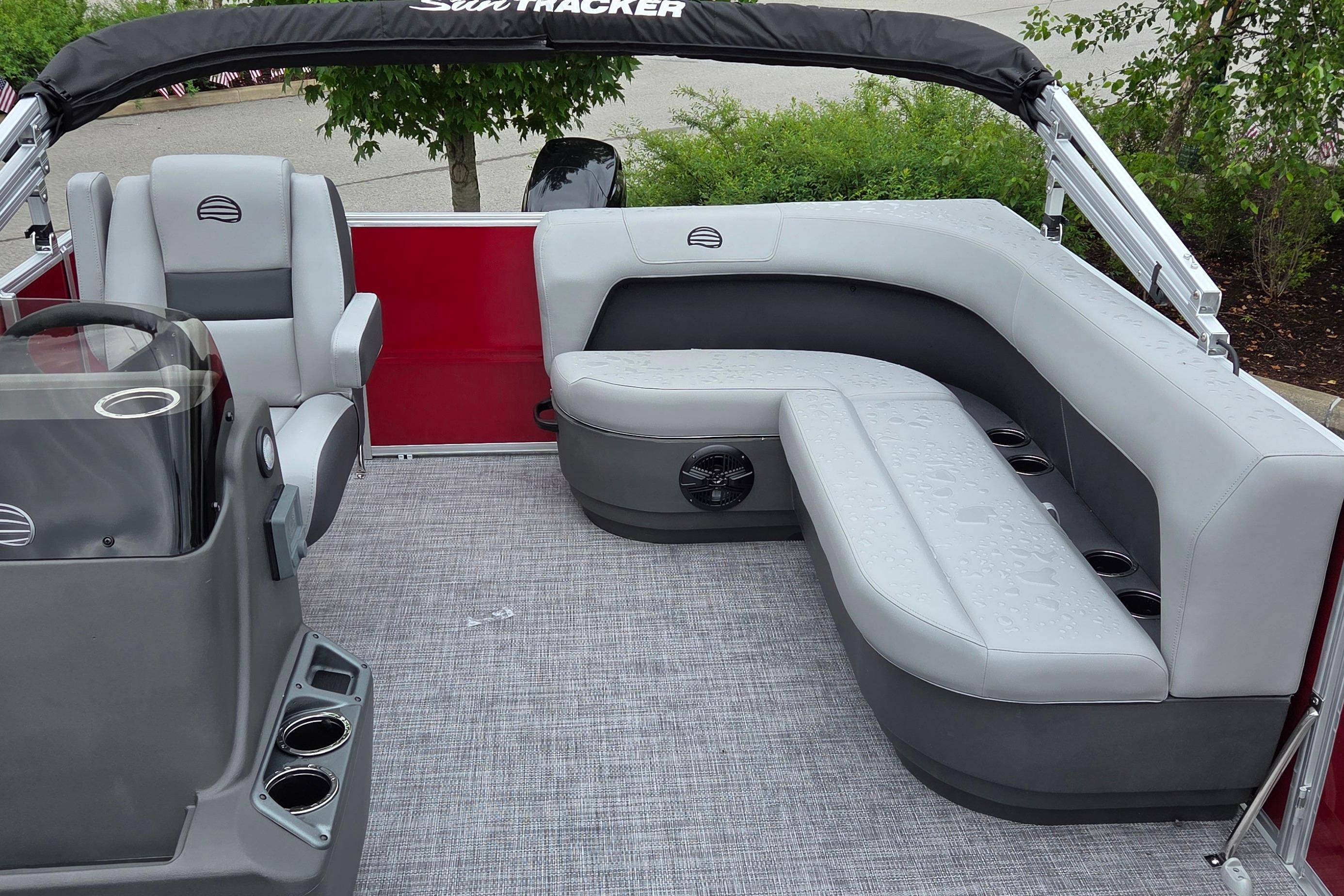 2026 Sun Tracker Party Barge 16 DLX interior with gray seating and modern design.