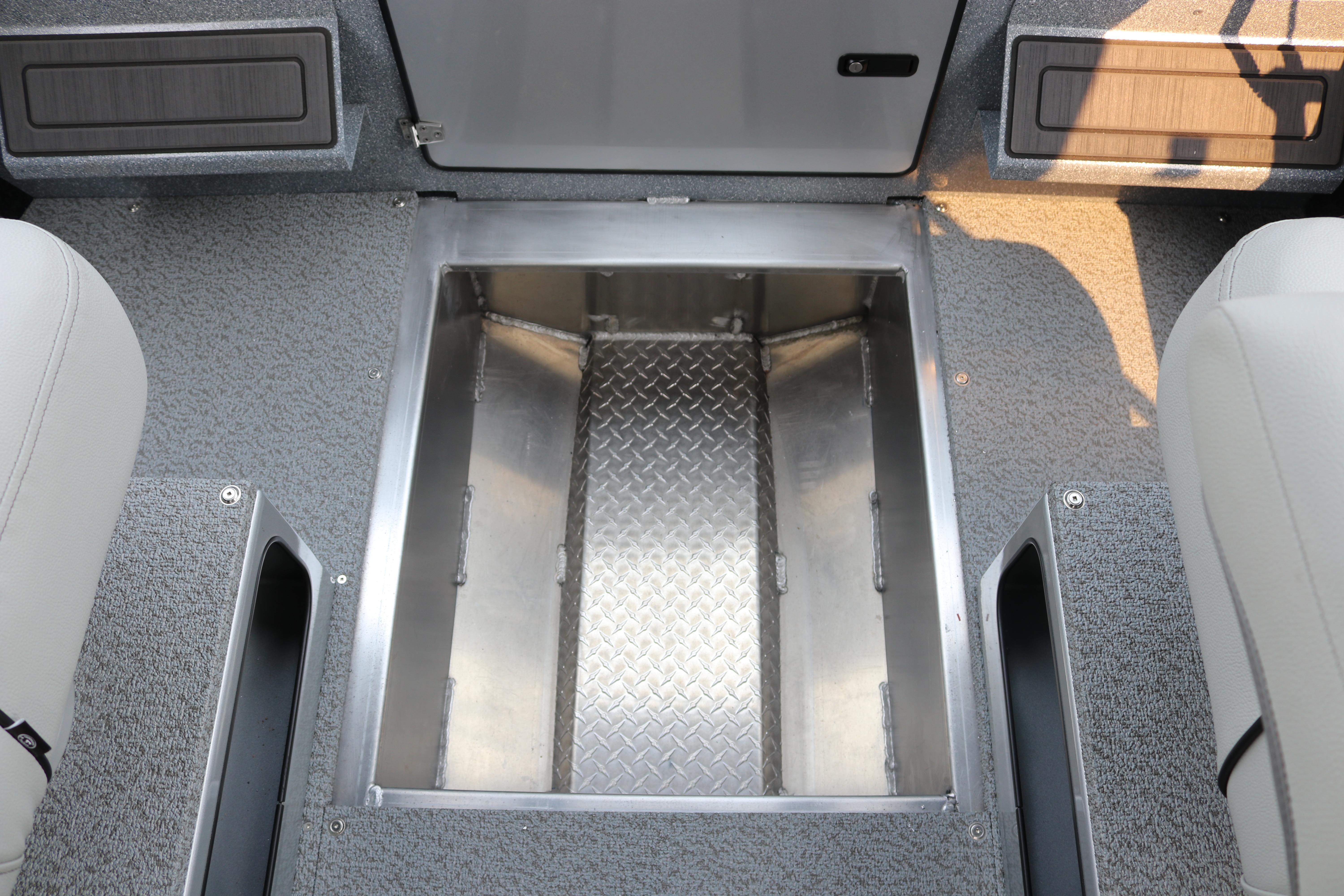 Interior view of 2026 KingFisher 2425 Escape HT boat, featuring a metal storage compartment.