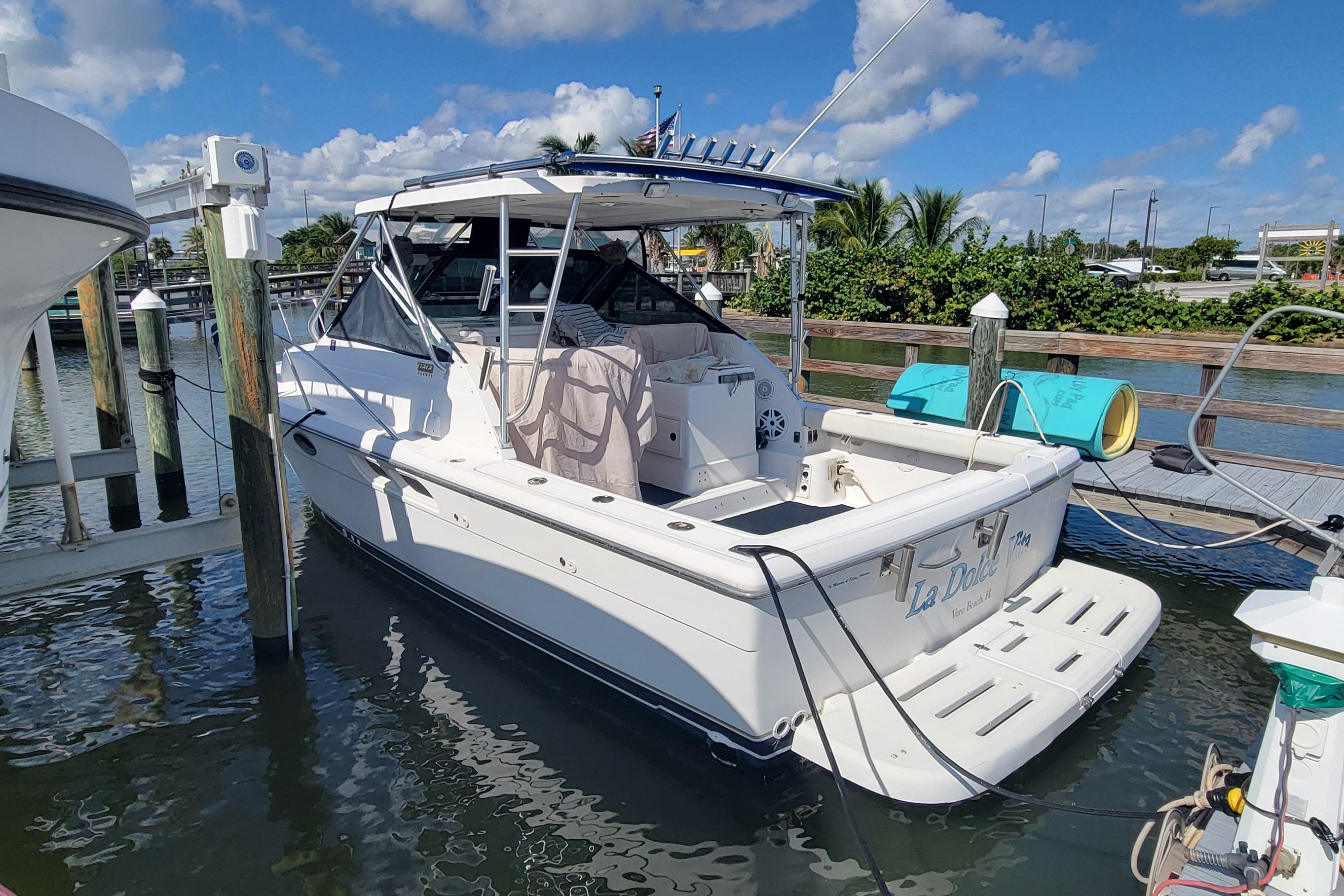 2006 Tiara Yachts 2900 Open Classic docked, featuring sleek design and spacious deck.
