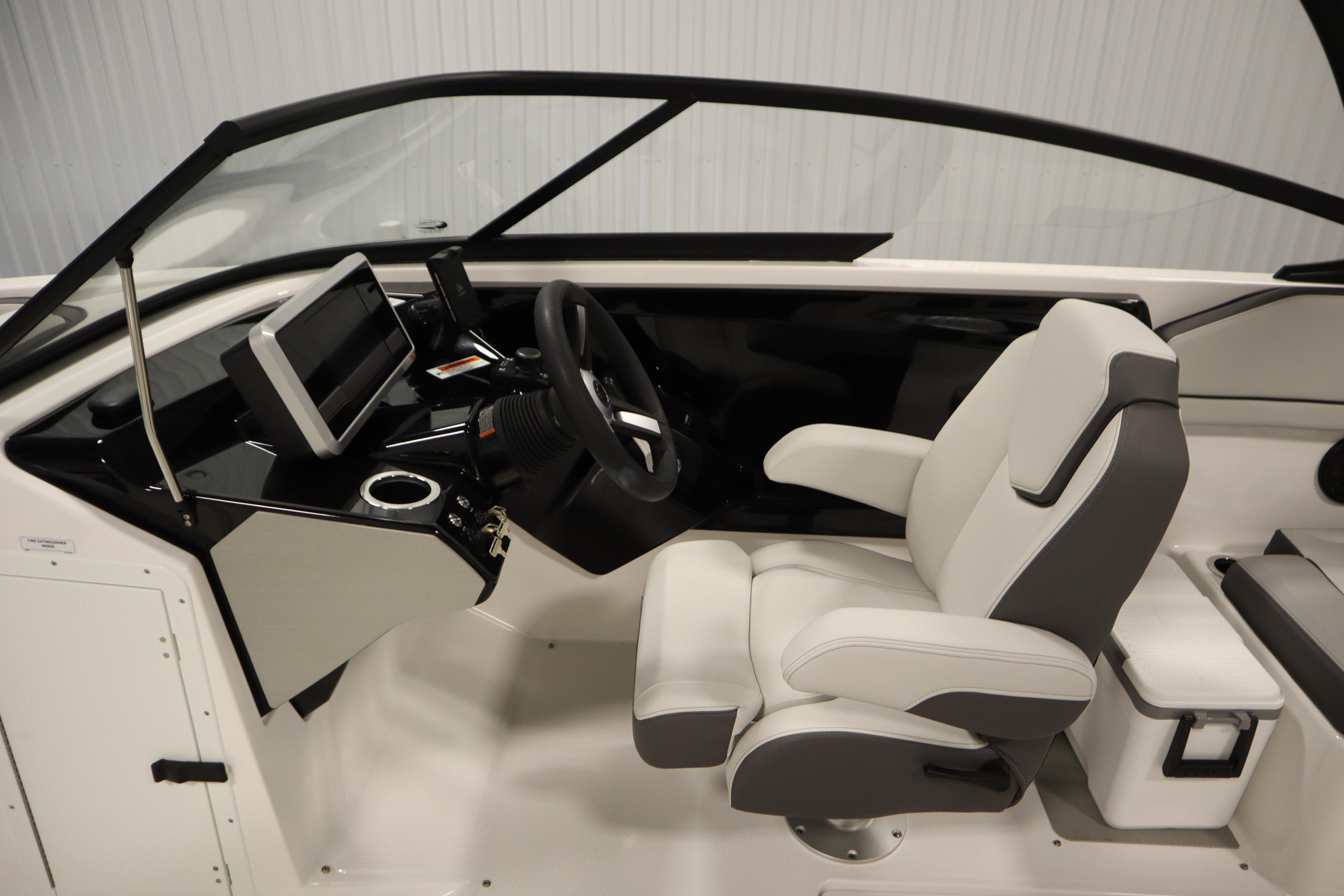 2026 Yamaha Boats AR250 cockpit with modern steering and comfortable seating.
