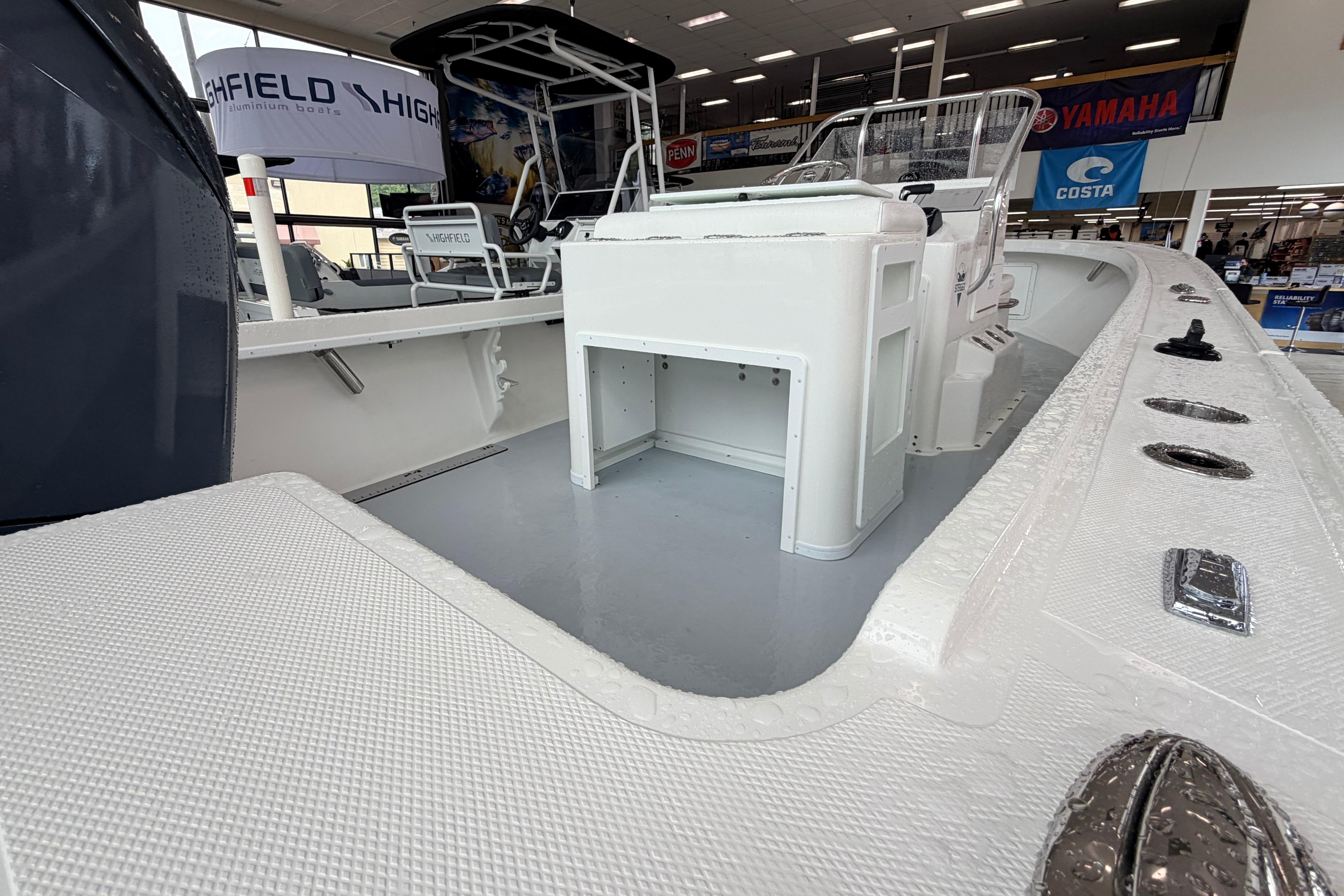 2025 Steiger Craft 21 Classic boat interior at a showroom, featuring sleek design and modern amenities.