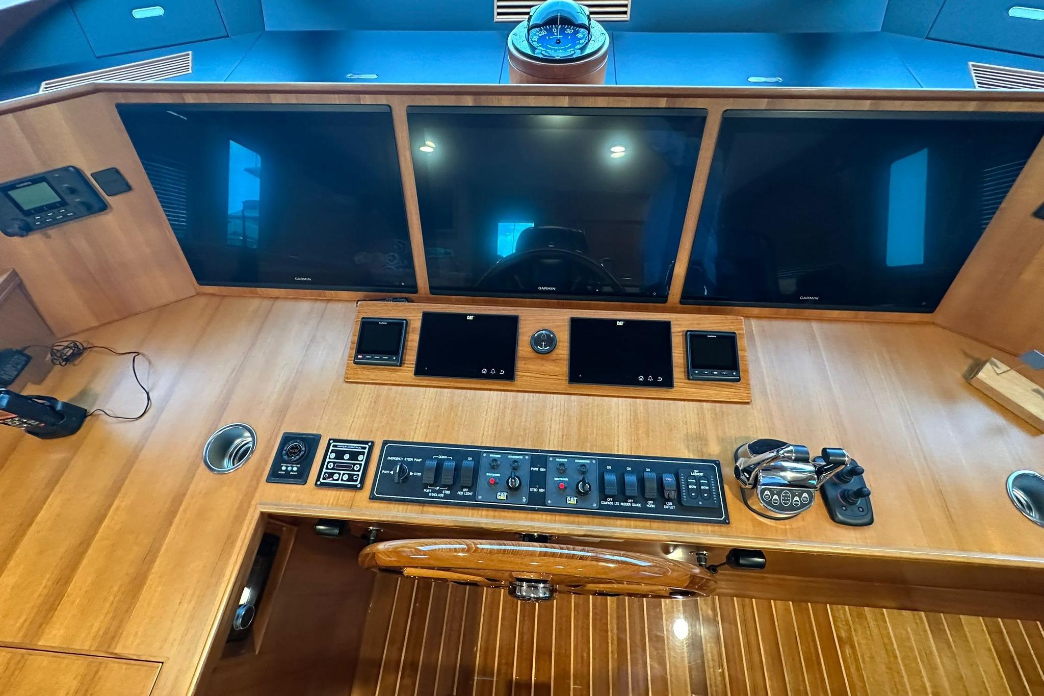 2023 Marlow Explorer 66E-CB helm with advanced navigation displays and controls.