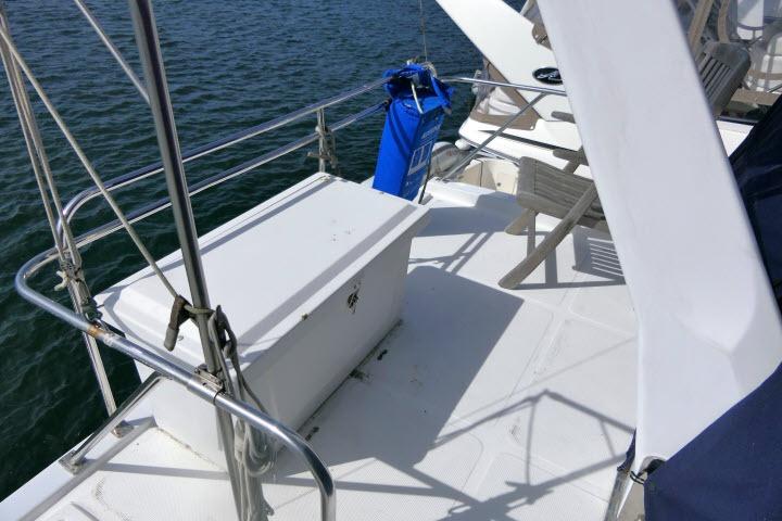 1986 Ocean Alexander 39 Sedan deck with storage box and seating area.