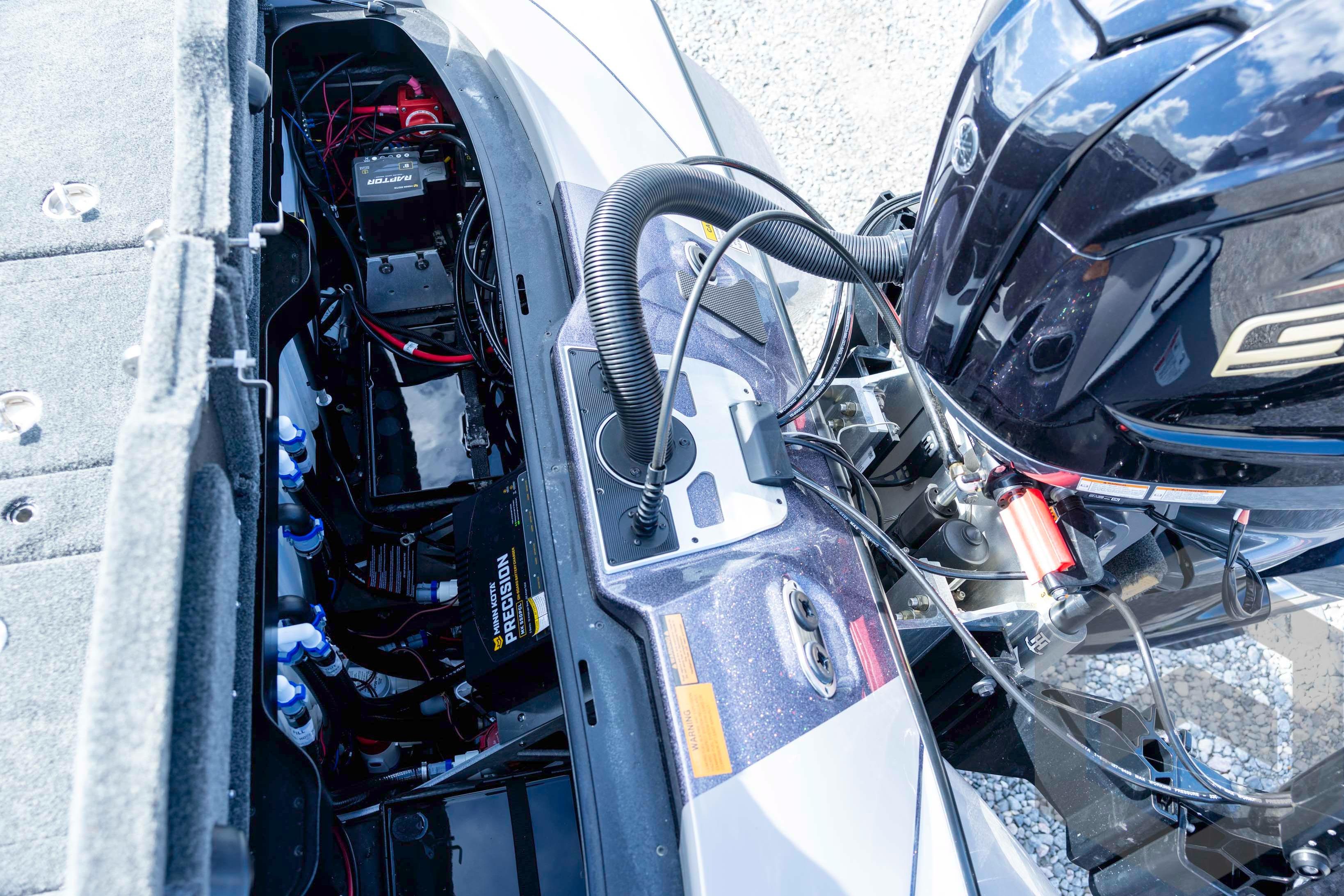 2026 Skeeter FXR20 FLEX boat engine compartment with wiring and components visible.