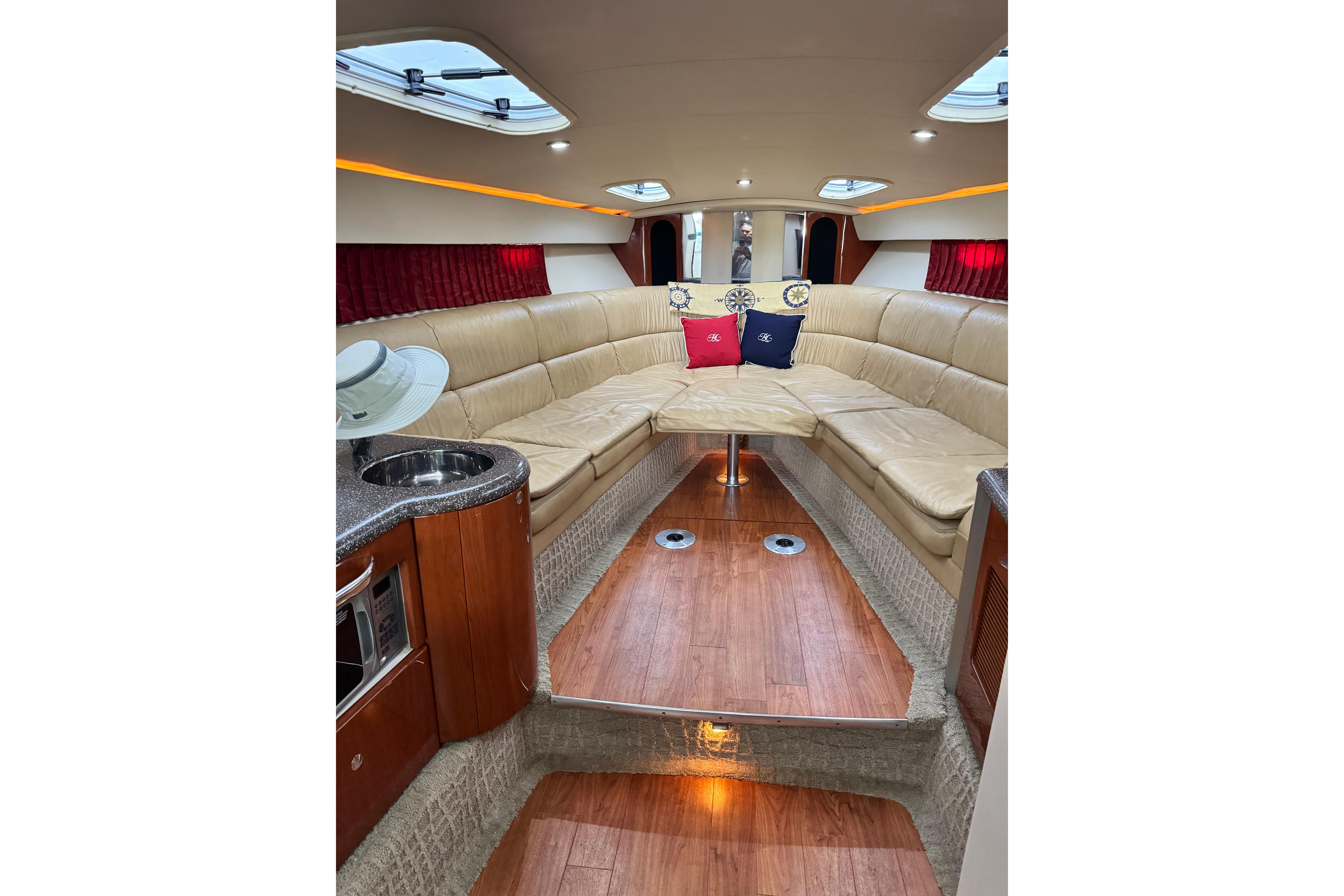Luxurious interior of a 2008 Formula 400 Super Sport yacht with plush seating and modern amenities.