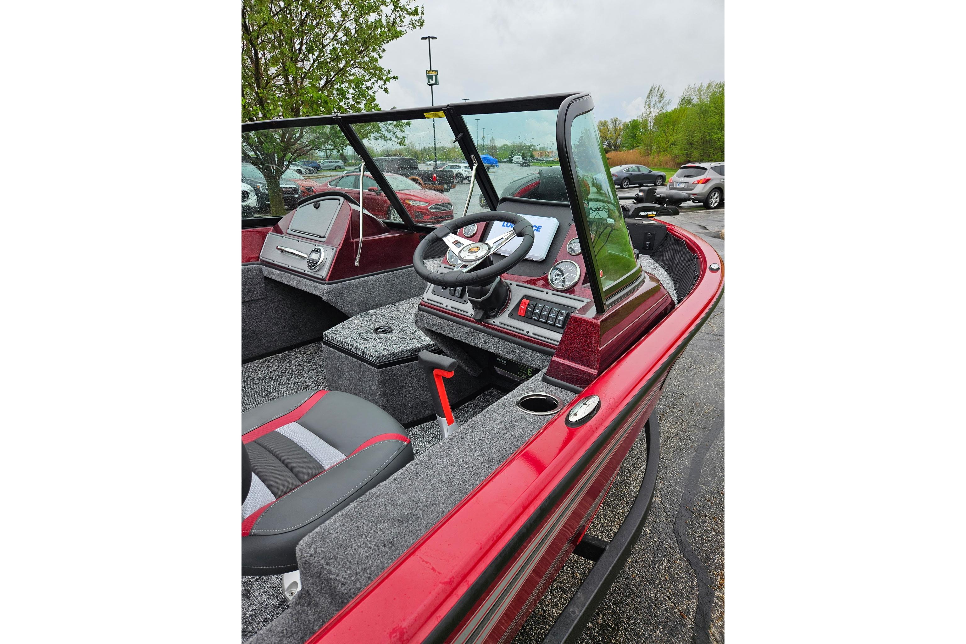 2026 Ranger VS1782SC Reata boat interior with steering wheel and dashboard controls.