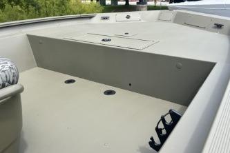 2026 Tracker Grizzly 1860 CC boat interior, featuring spacious deck and storage compartments.