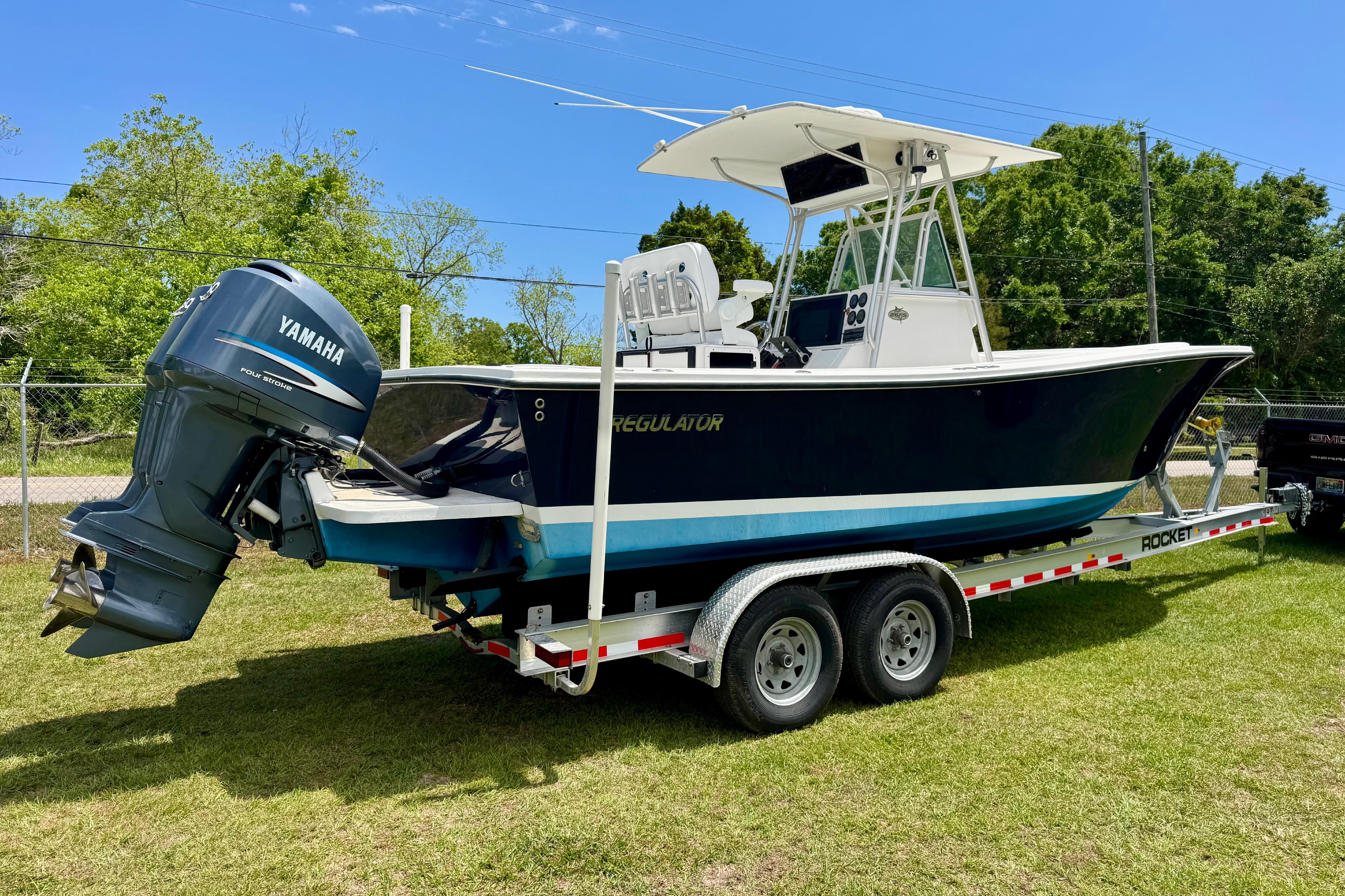 2000 Regulator 26 Forward Seating boat on trailer with Yamaha outboard motor.
