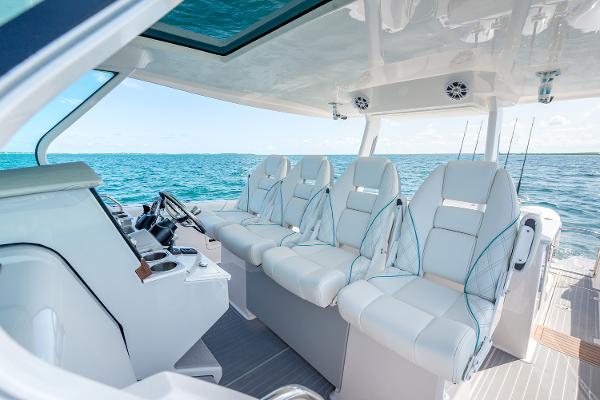 Manufacturer Provided Image: Luxurious 2026 Regal 38 SAV boat interior with plush seating and ocean view.