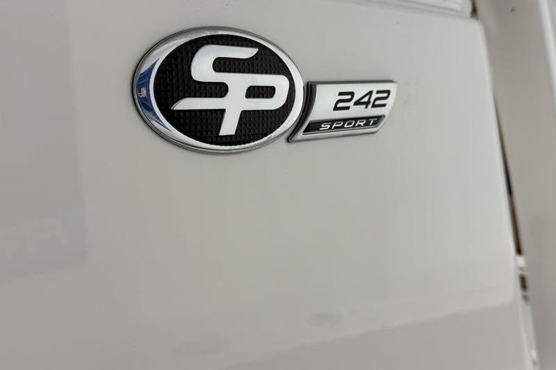 2026 Sea Pro 242 Center Console emblem on white surface.