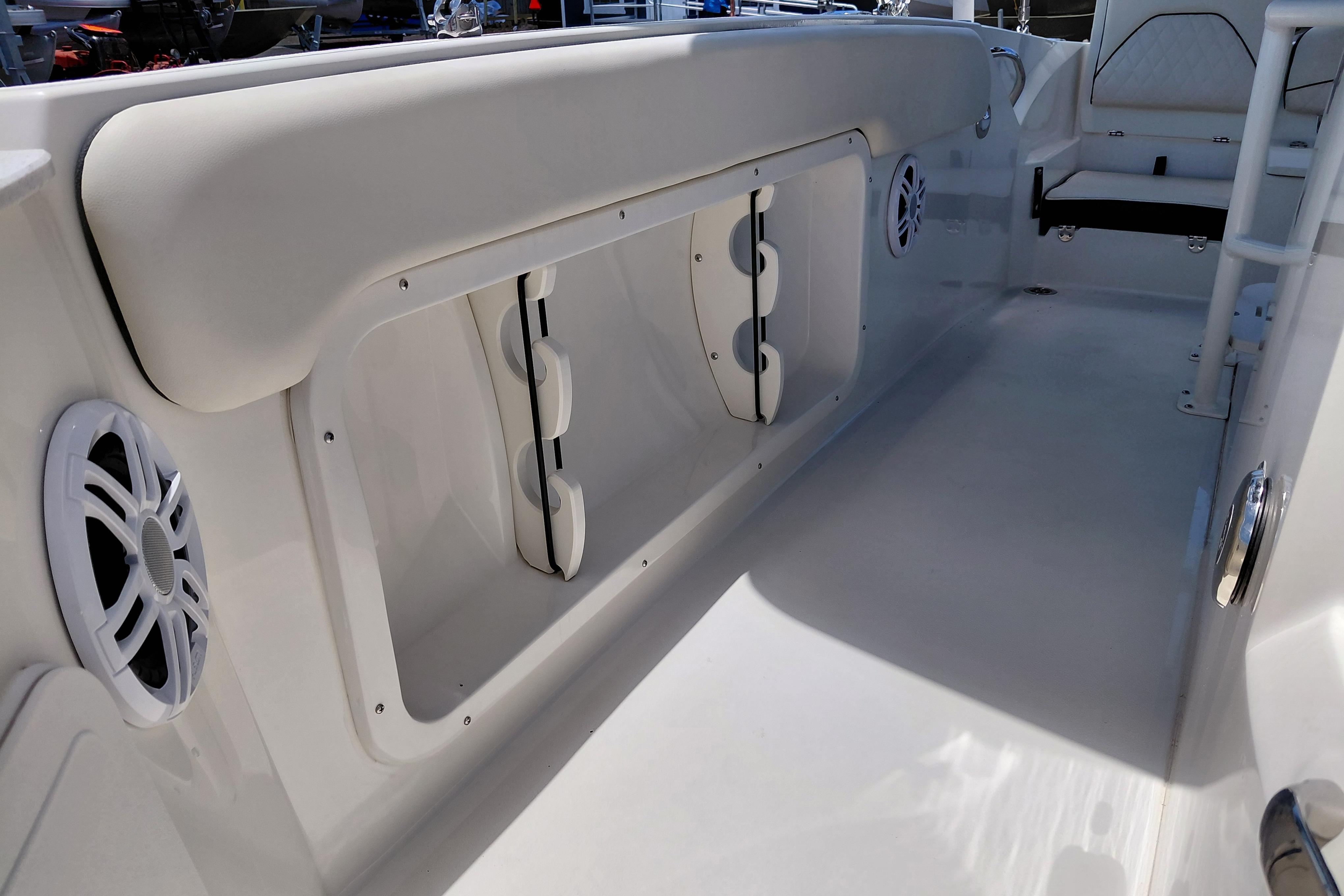 2023 Stingray 206 CC boat interior with cushioned seating and built-in speakers.