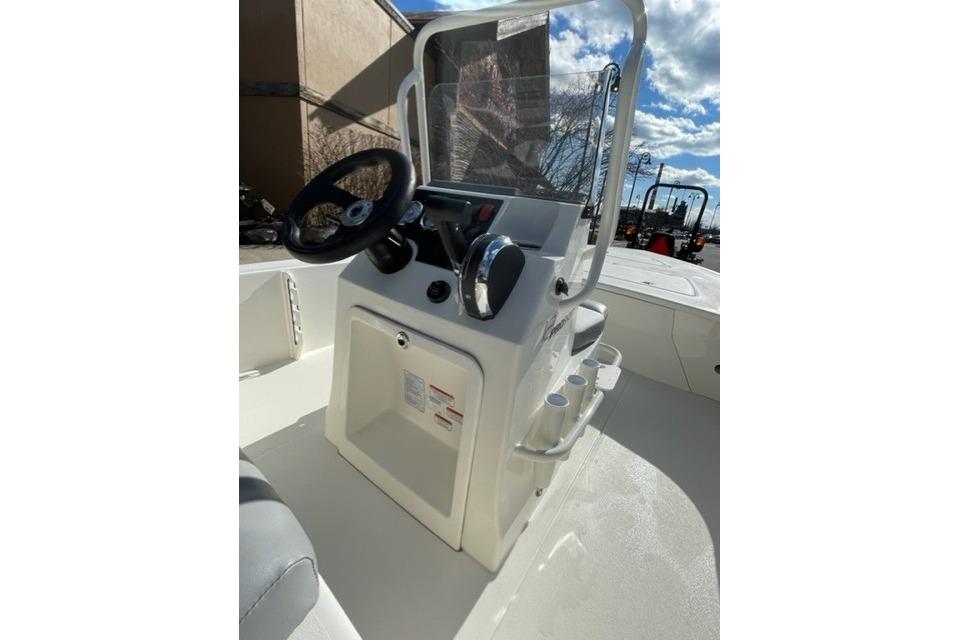 2026 Mako 18 Pro Skiff boat console with steering wheel and controls.